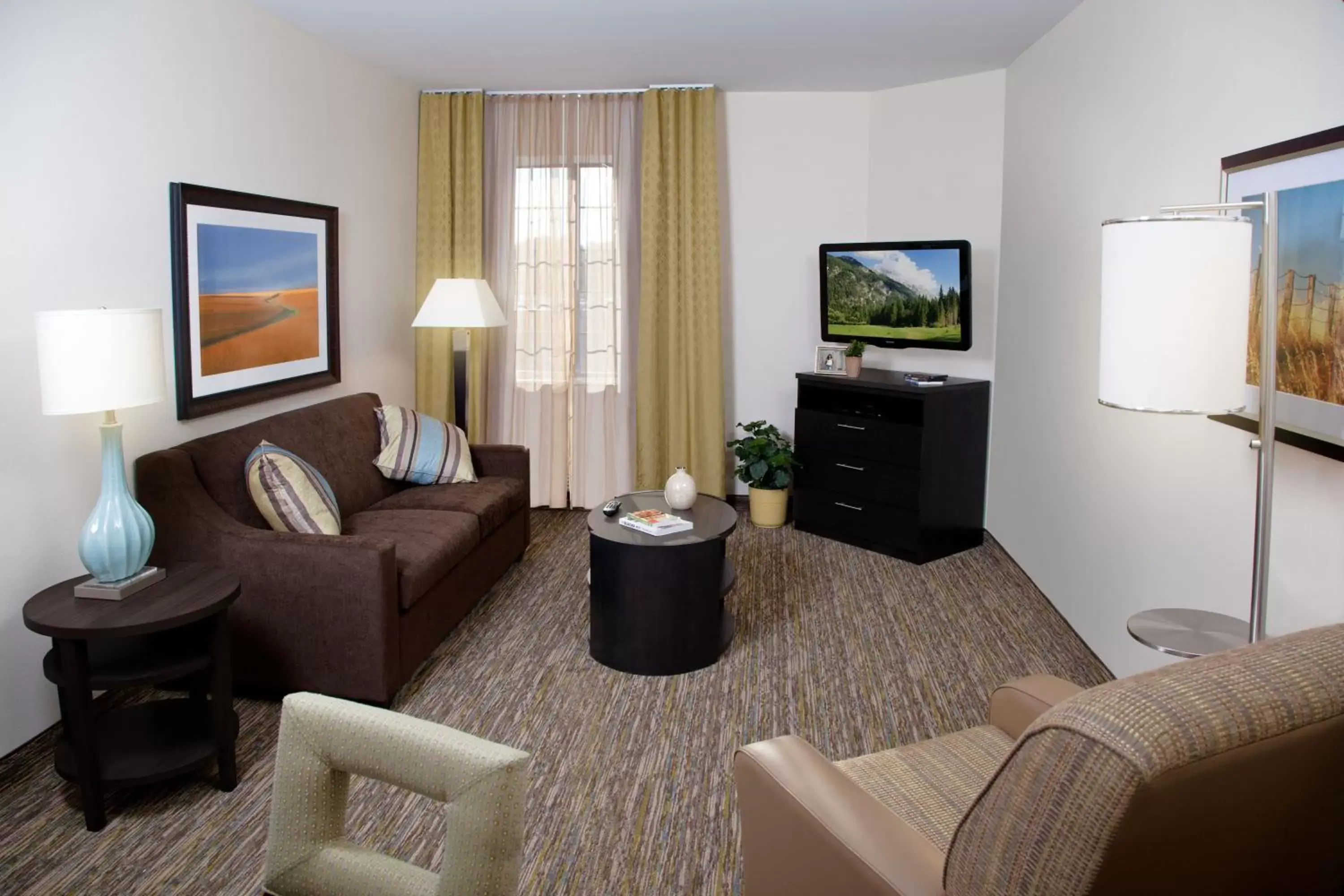 Photo of the whole room, Seating Area in Candlewood Suites North Little Rock, an IHG Hotel