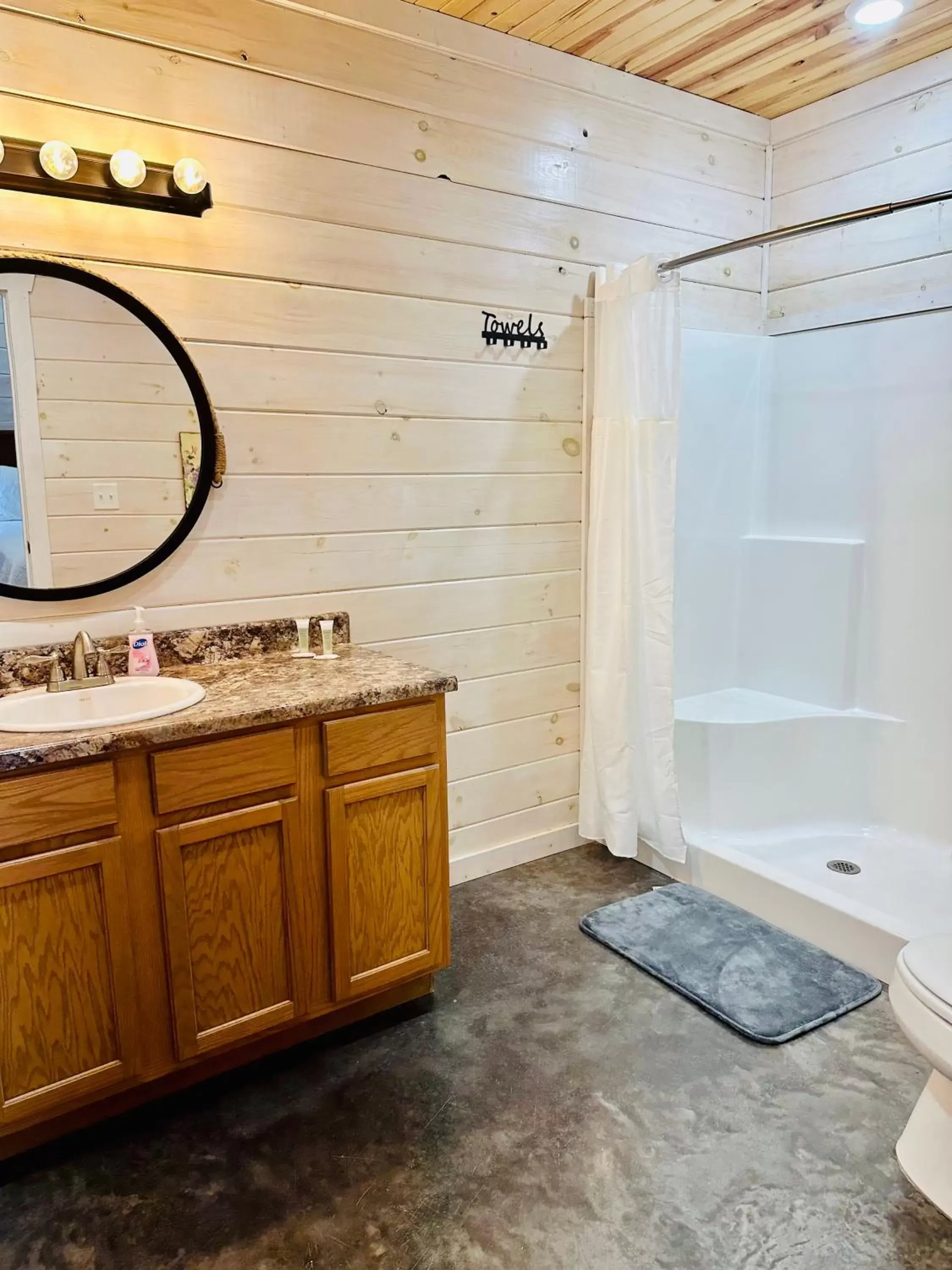 Shower, Bathroom in Knotty Squirrel Cabins