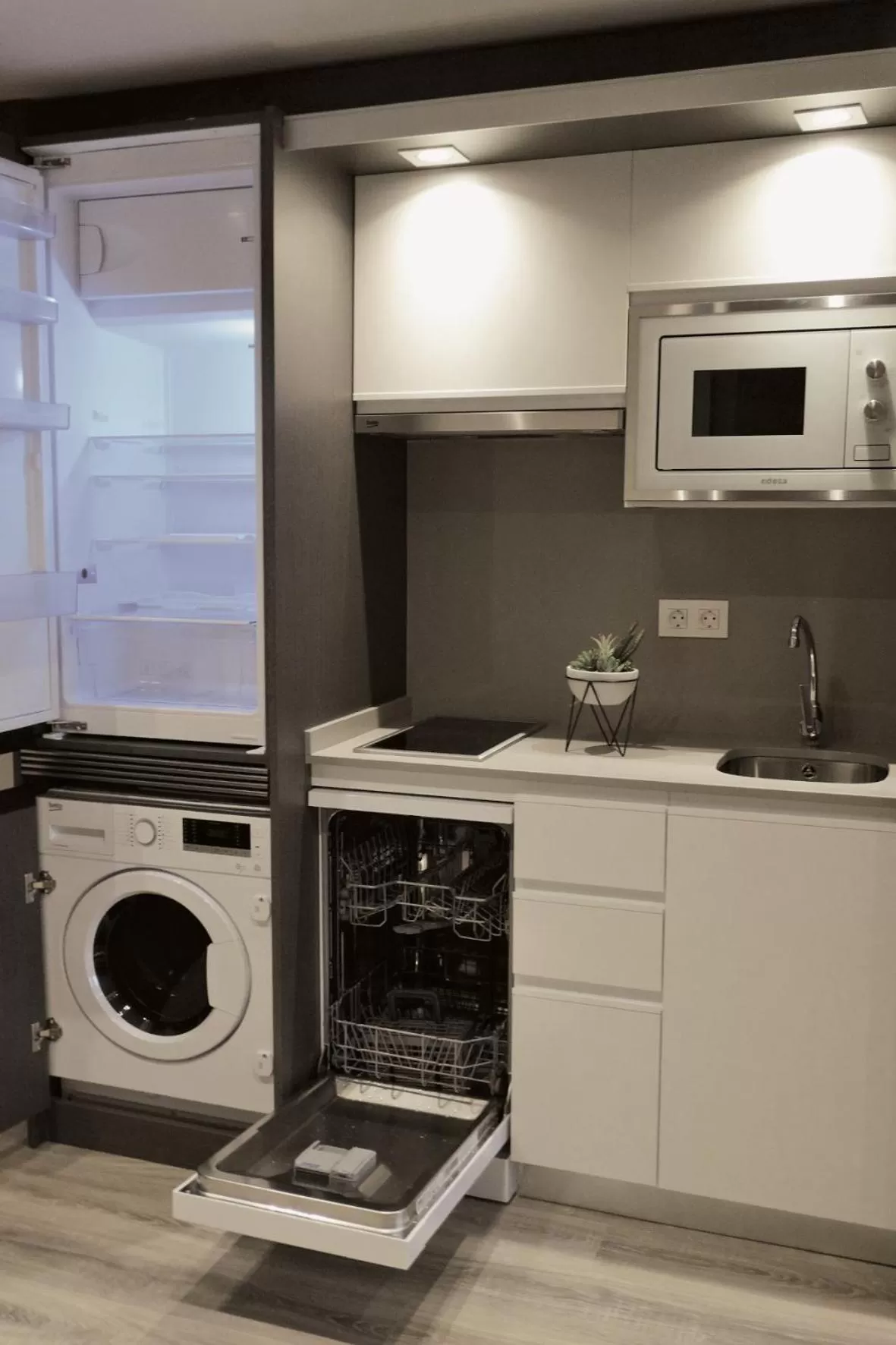 Kitchen or kitchenette in Bilbao City Center by abba Suites