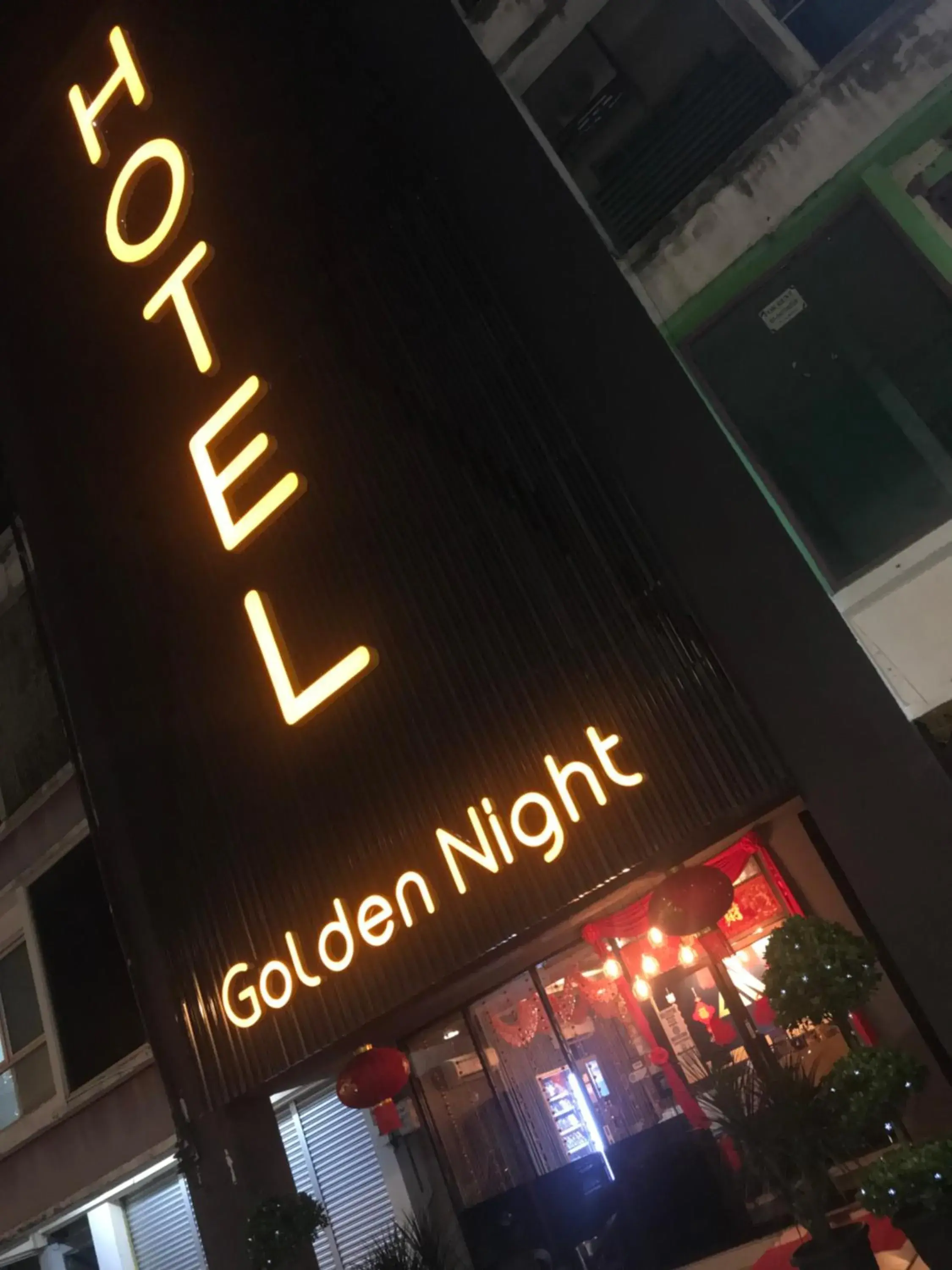 Property logo or sign in Golden Night Hotel