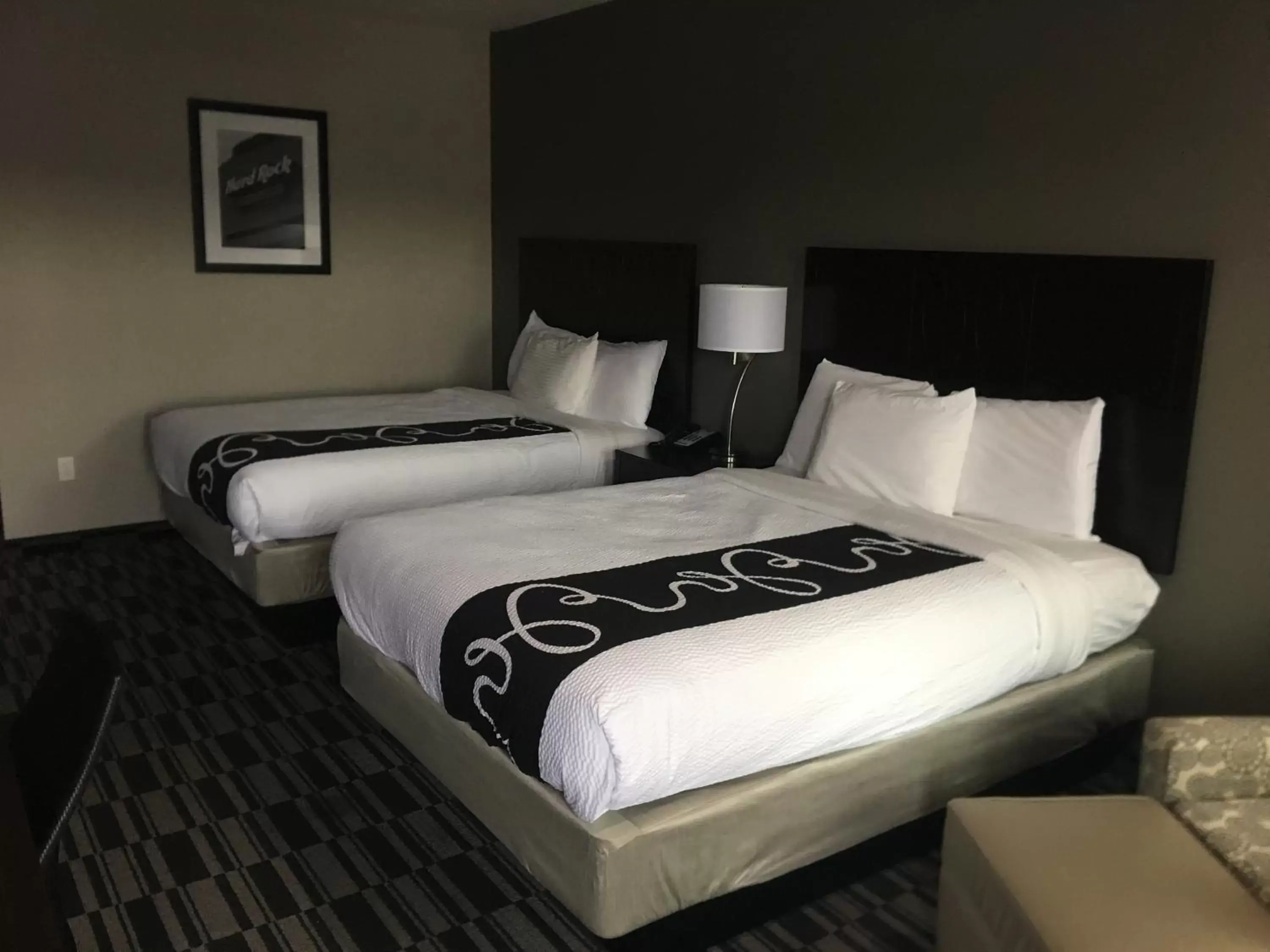 Bed in Catoosa Inn & Suites