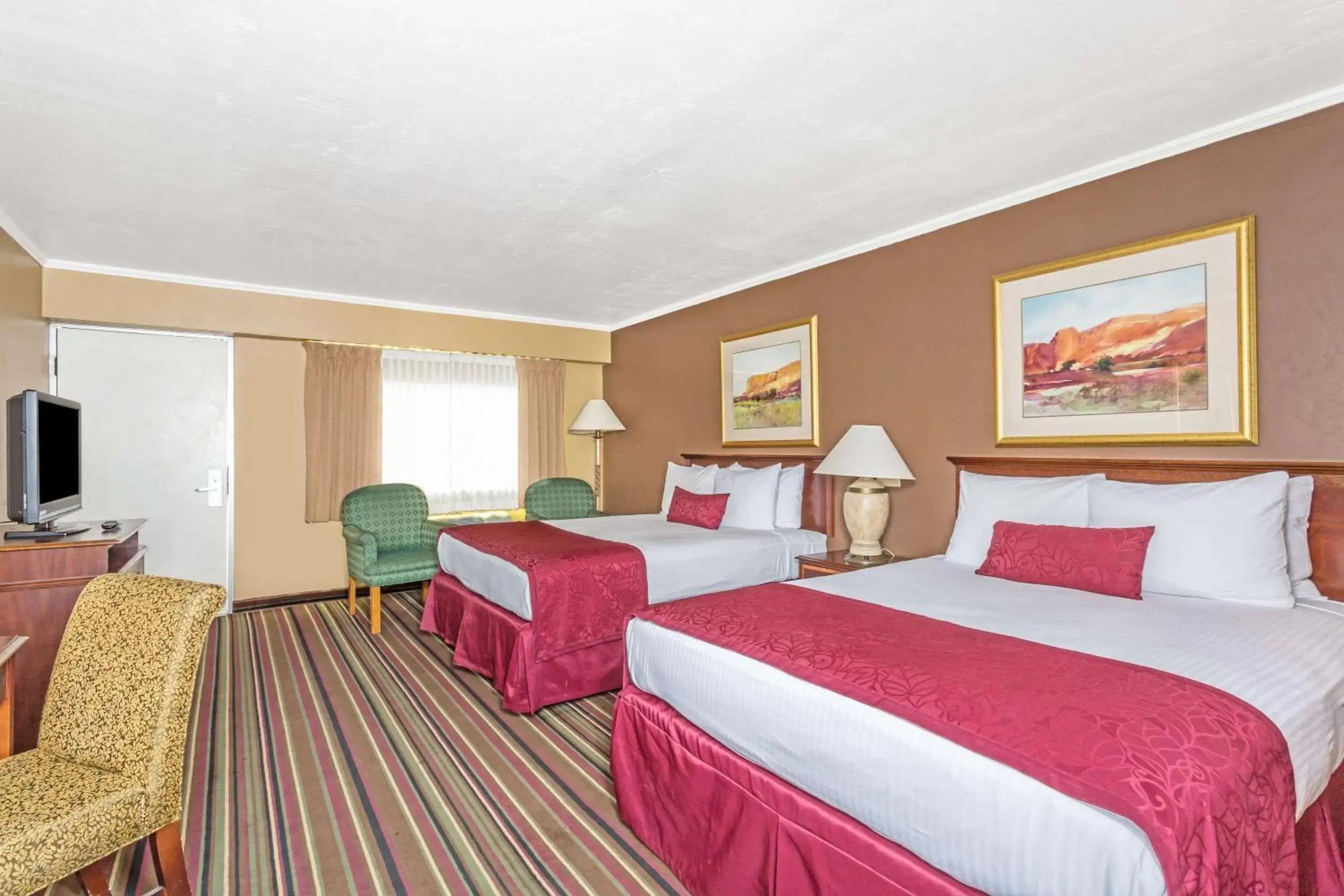 Photo of the whole room in Days Inn & Suites by Wyndham Logan