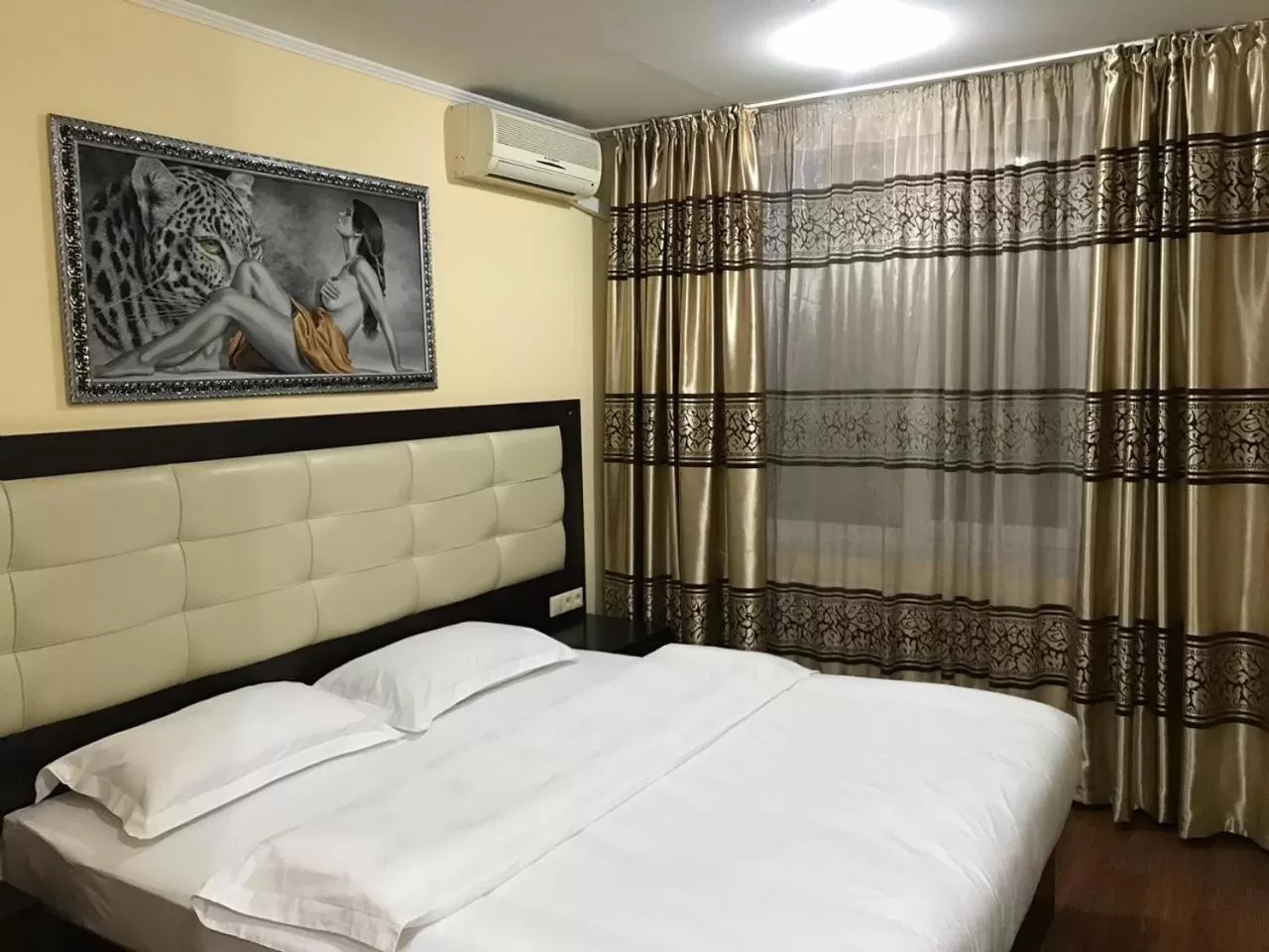 Bed in Altai Business Hotel