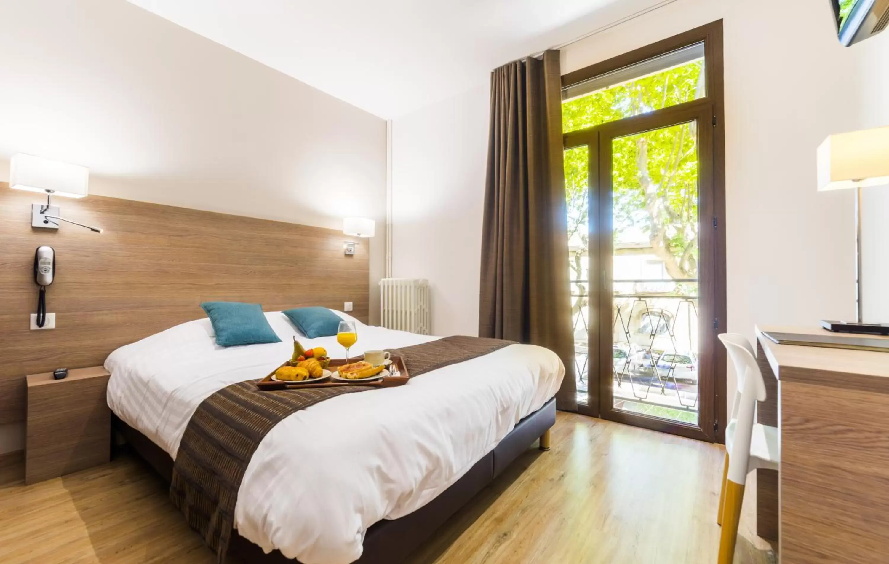 Bedroom, Bed in Logis Hôtel Restaurant Le Cours Bedroom, Bed in Logis Hôtel Restaurant Le Cours