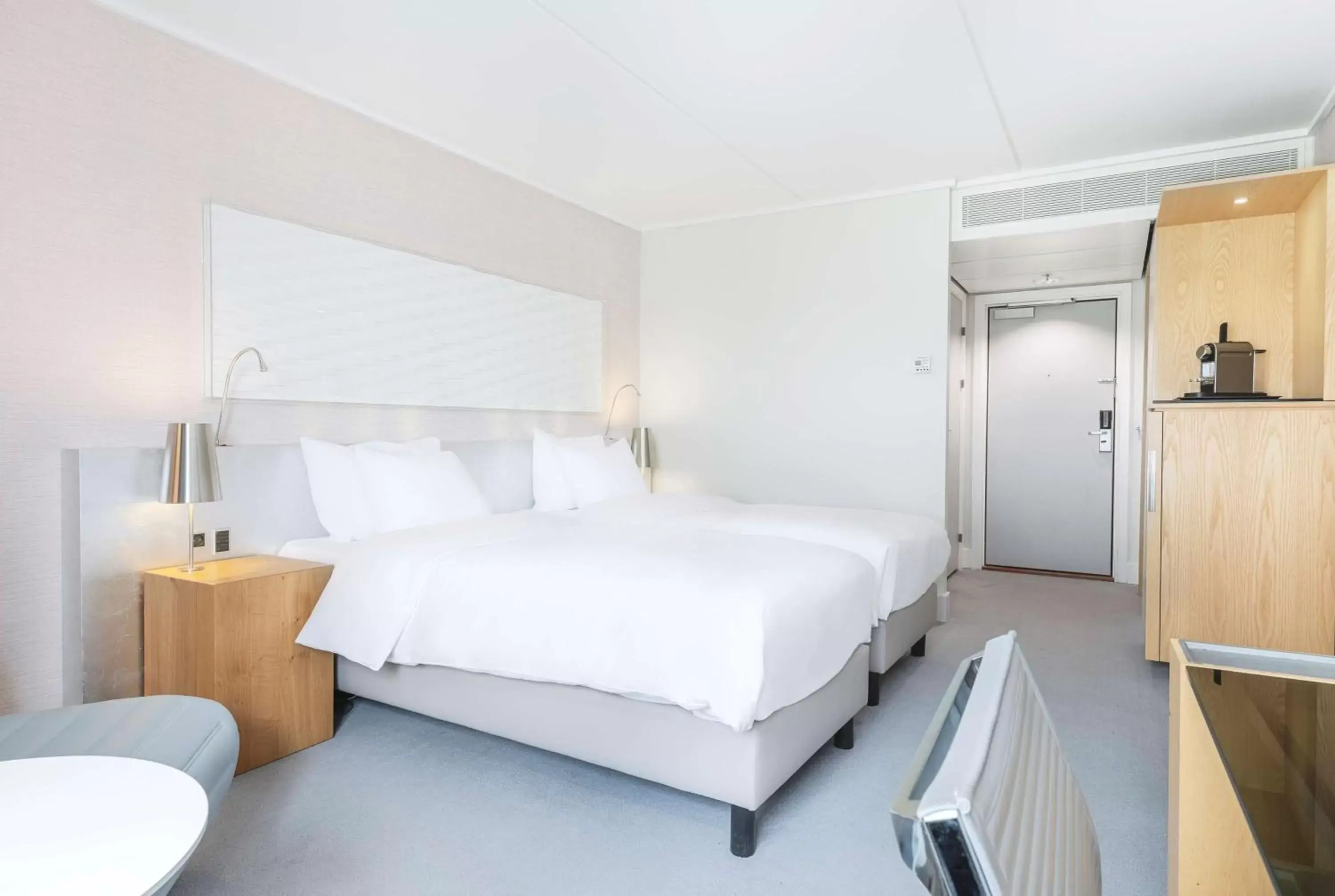 Seating area, Bed in Radisson Blu Scandinavia Hotel Aarhus