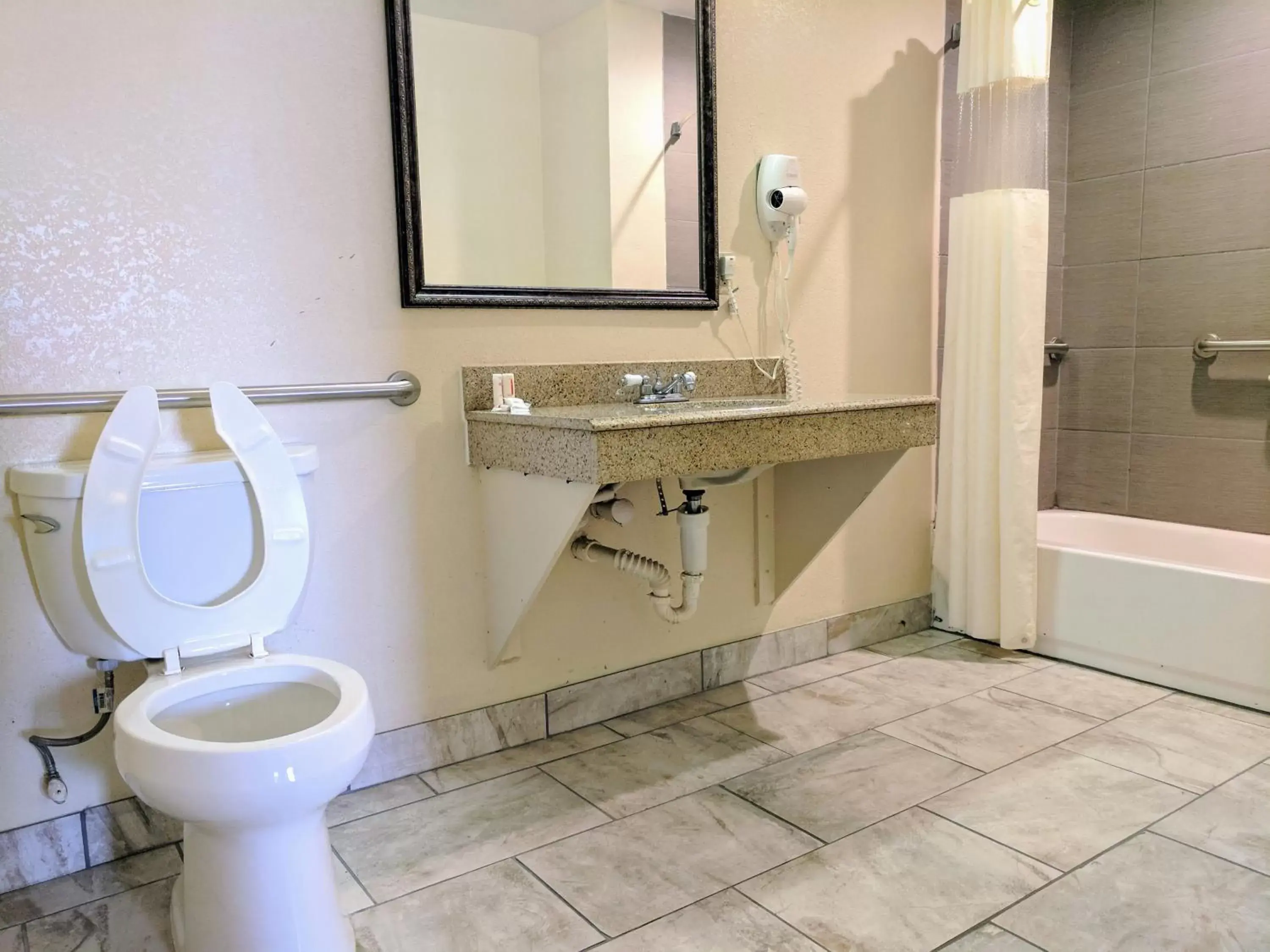 Bathroom in Days Inn by Wyndham San Antonio Interstate Hwy 35 North