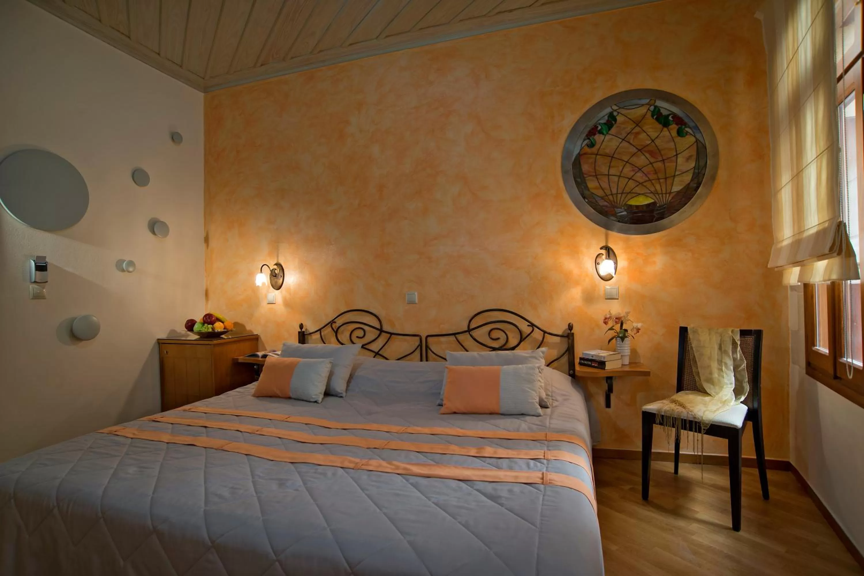 Bed in Ionas Boutique Hotel