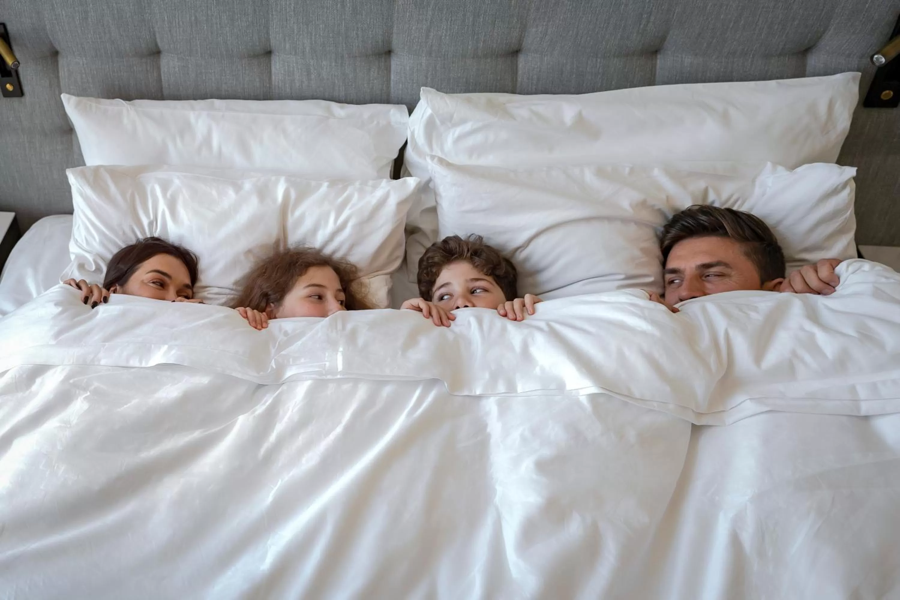 Bed in Th8 Palm Dubai Beach Resort Vignette Collection, an IHG hotel