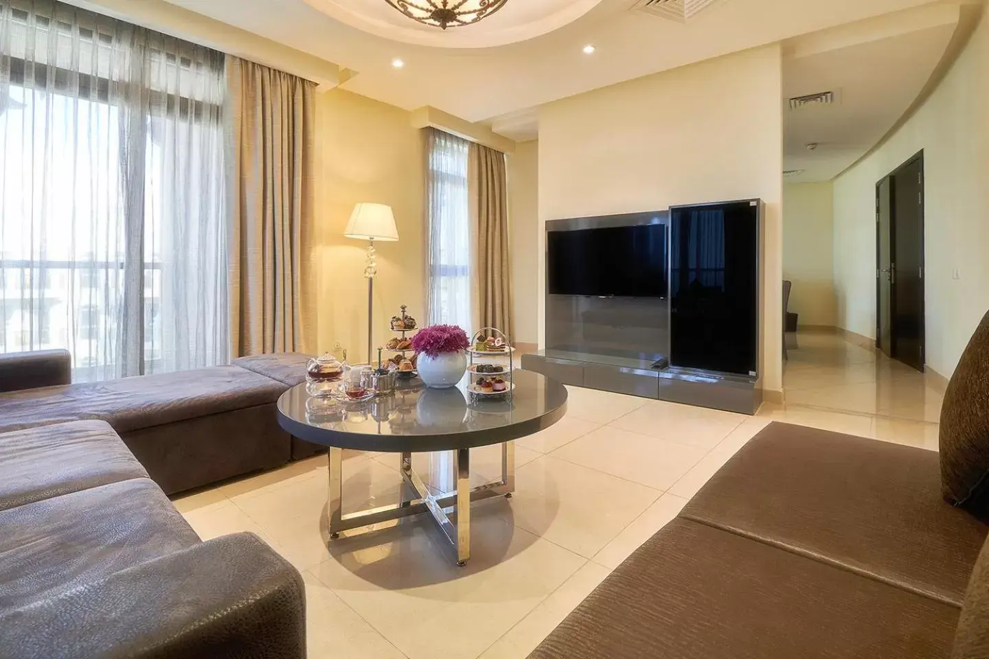 TV and multimedia, Seating Area in Bahi Ajman Palace Hotel