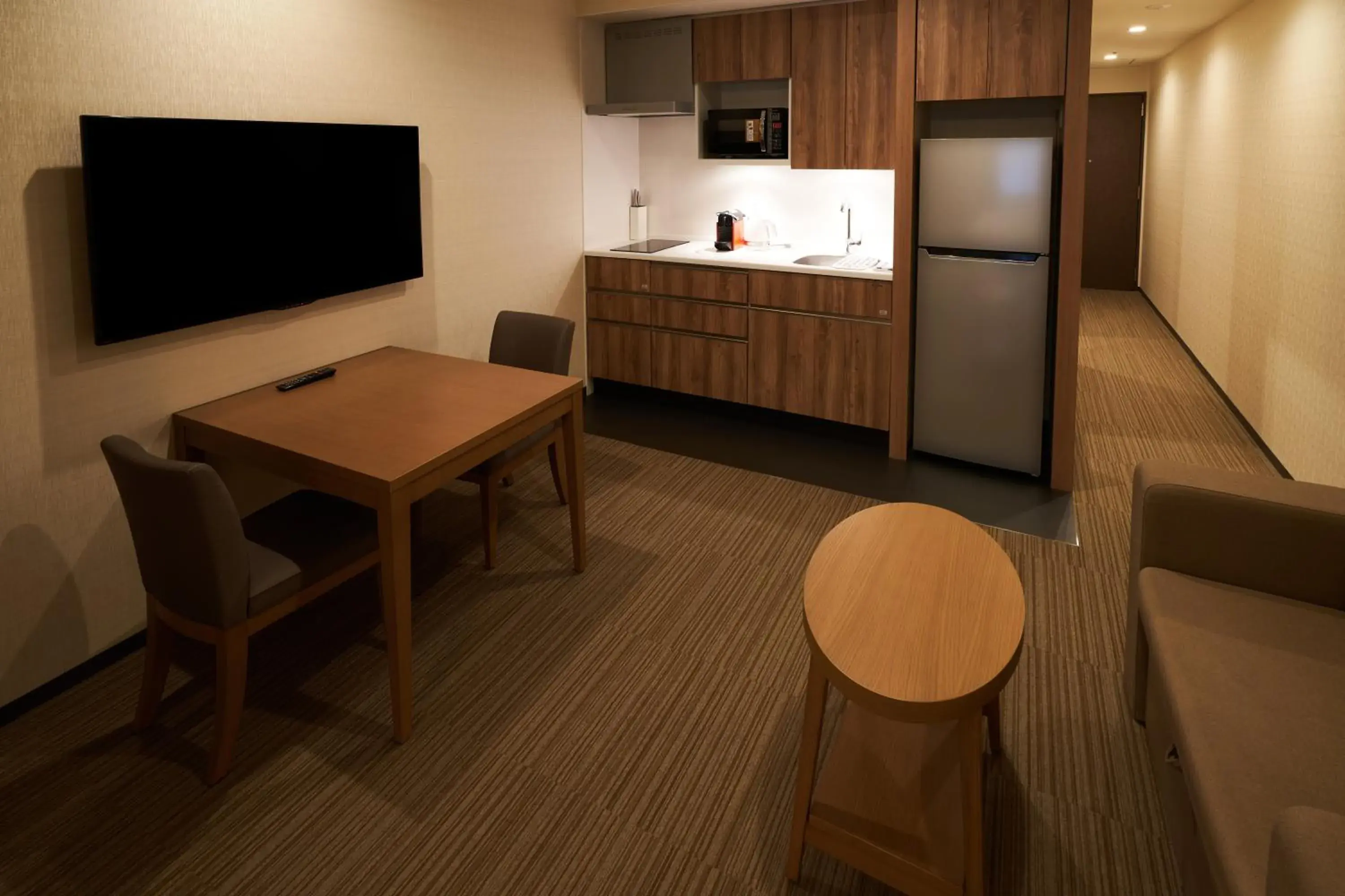 Photo of the whole room, TV/Entertainment Center in Holiday Inn & Suites Shin Osaka, an IHG Hotel