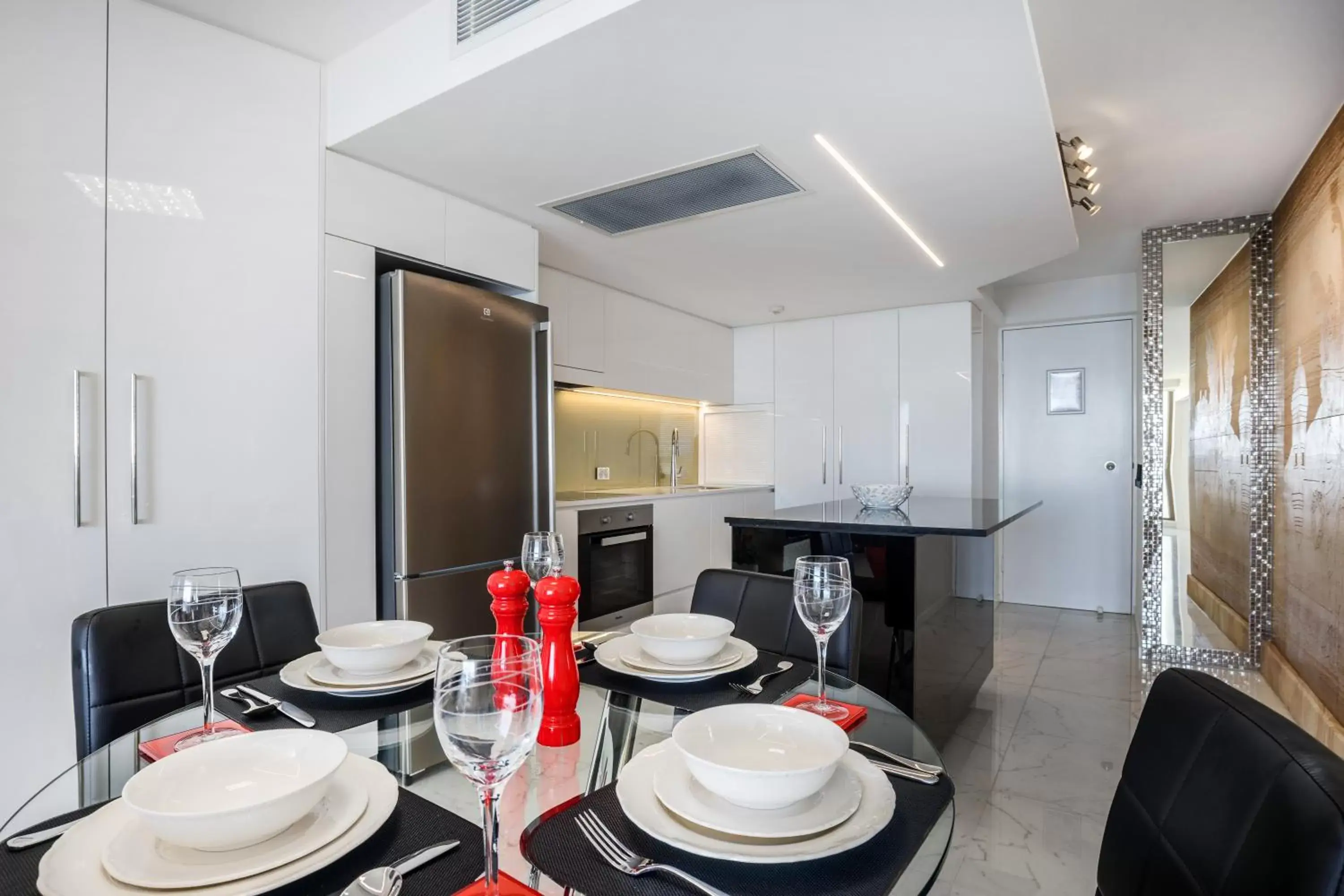 Kitchen or kitchenette, Dining Area in Pacific Beach Resort