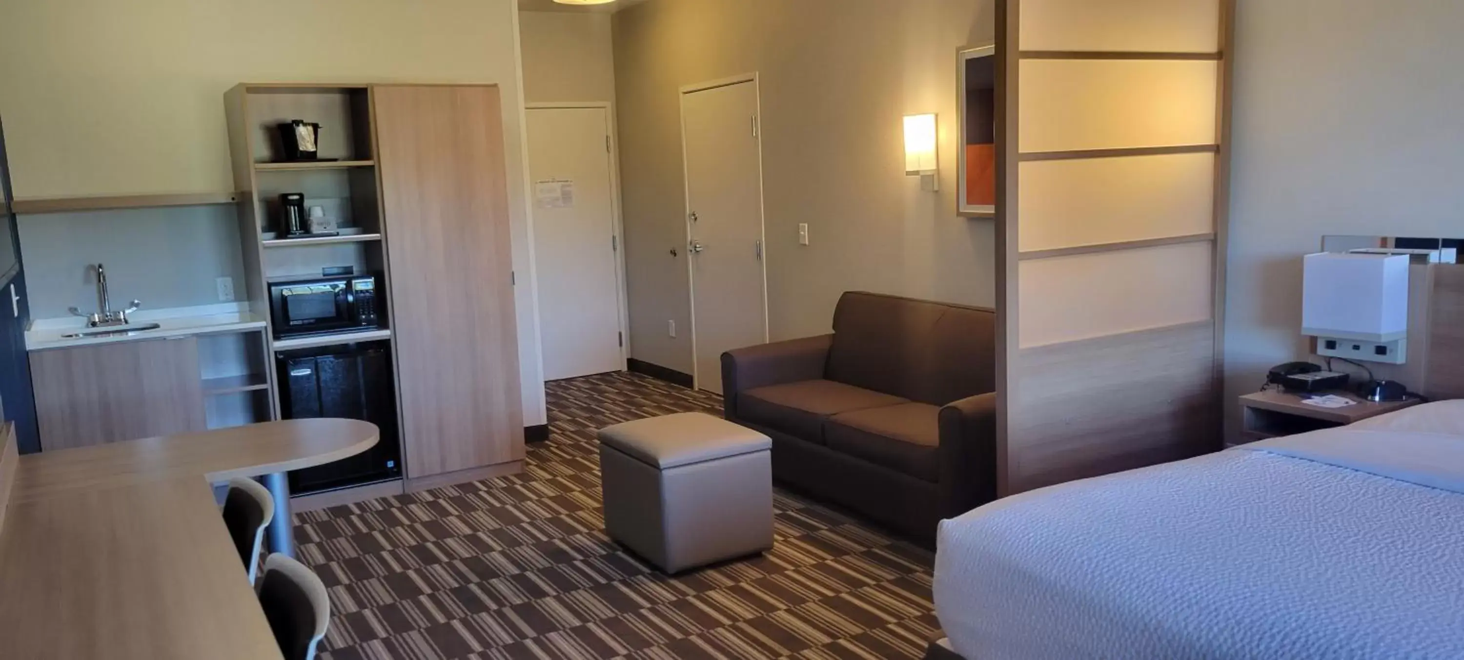 Bedroom, Seating Area in Microtel Inn & Suites by Wyndham Fountain North