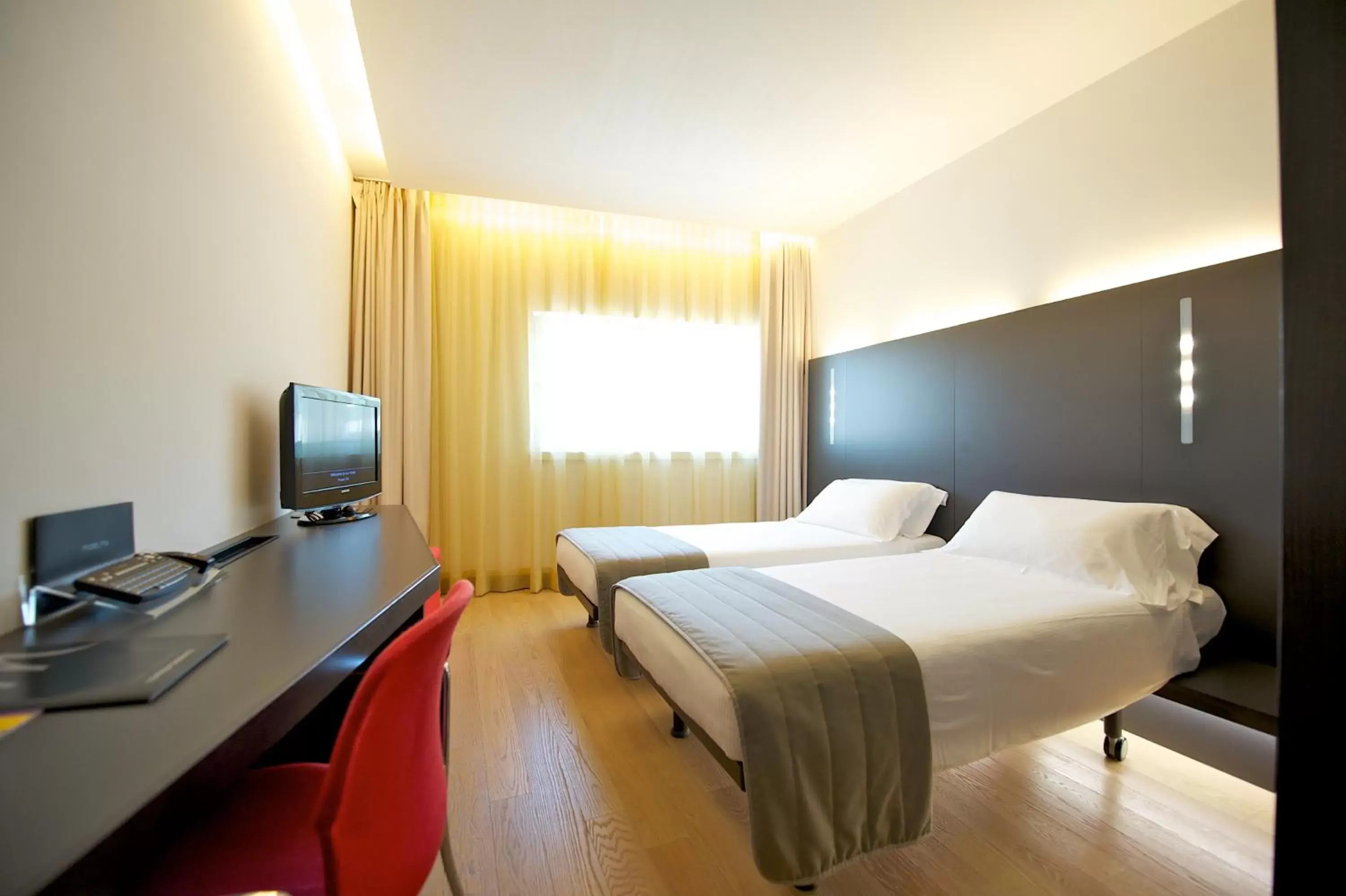 Bed in Mercure Nerocubo Rovereto