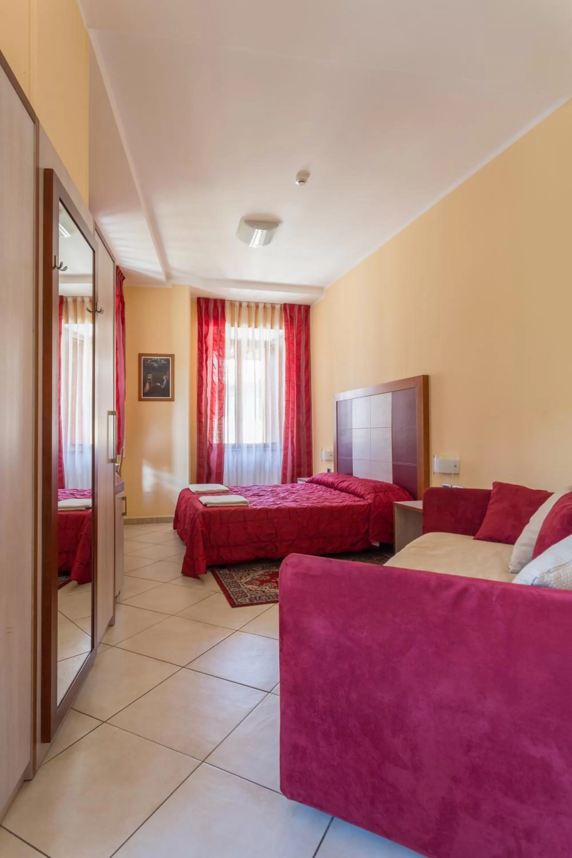 Bed in Hotel Conte Ruggero