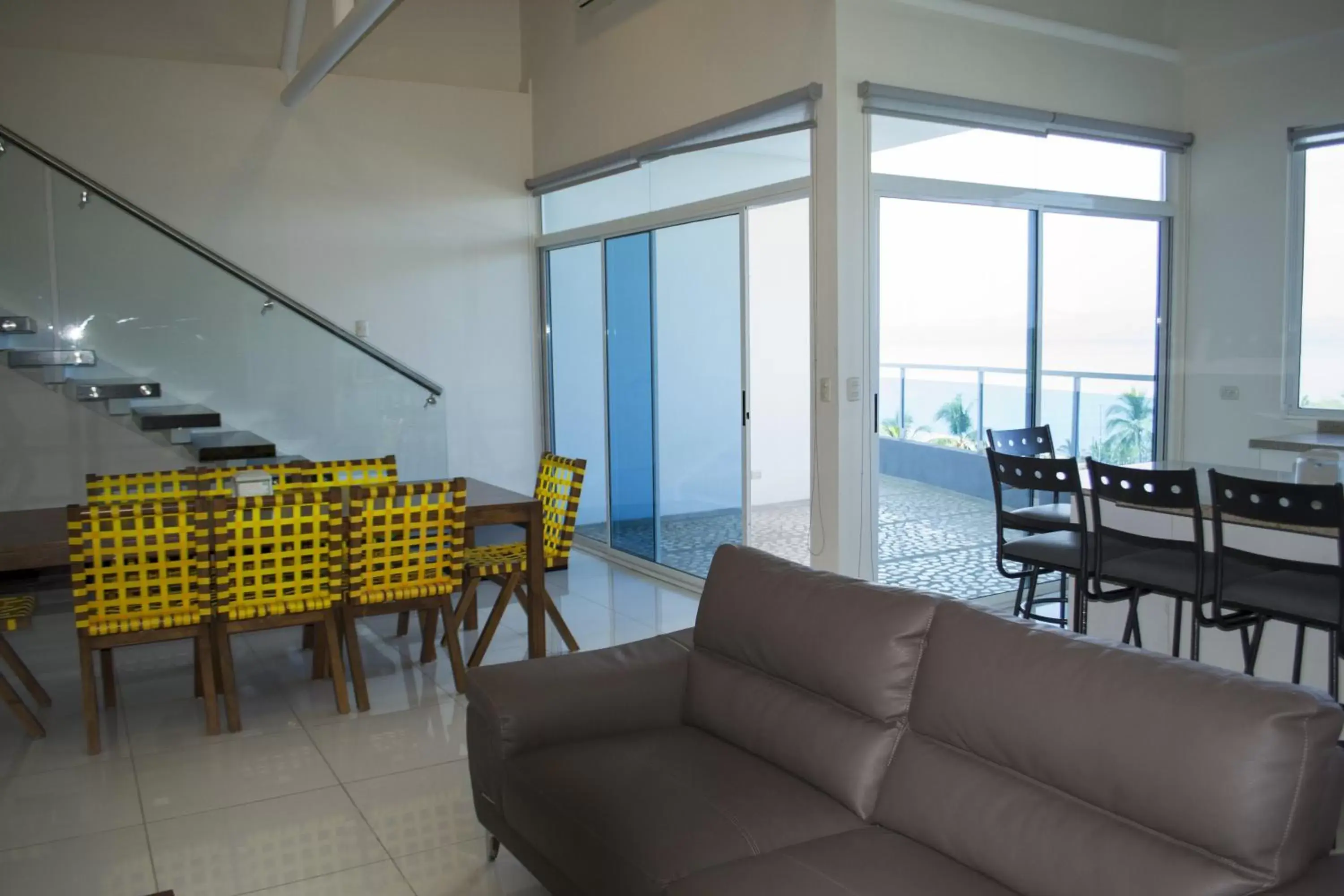 Living room, Dining Area in Puerto Azul Resort & Club Nautico