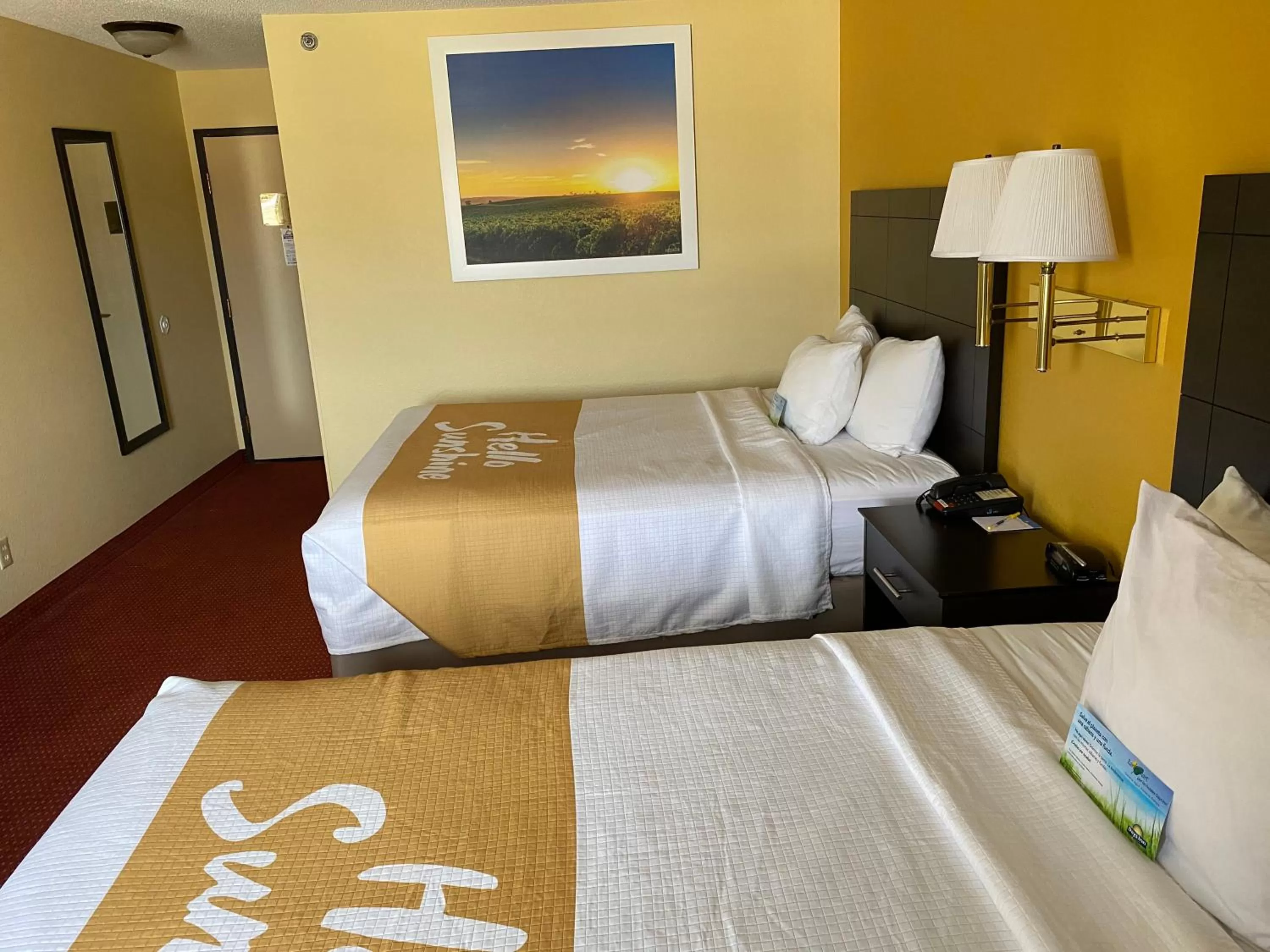 Bed in Days Inn & Suites by Wyndham Des Moines Airport