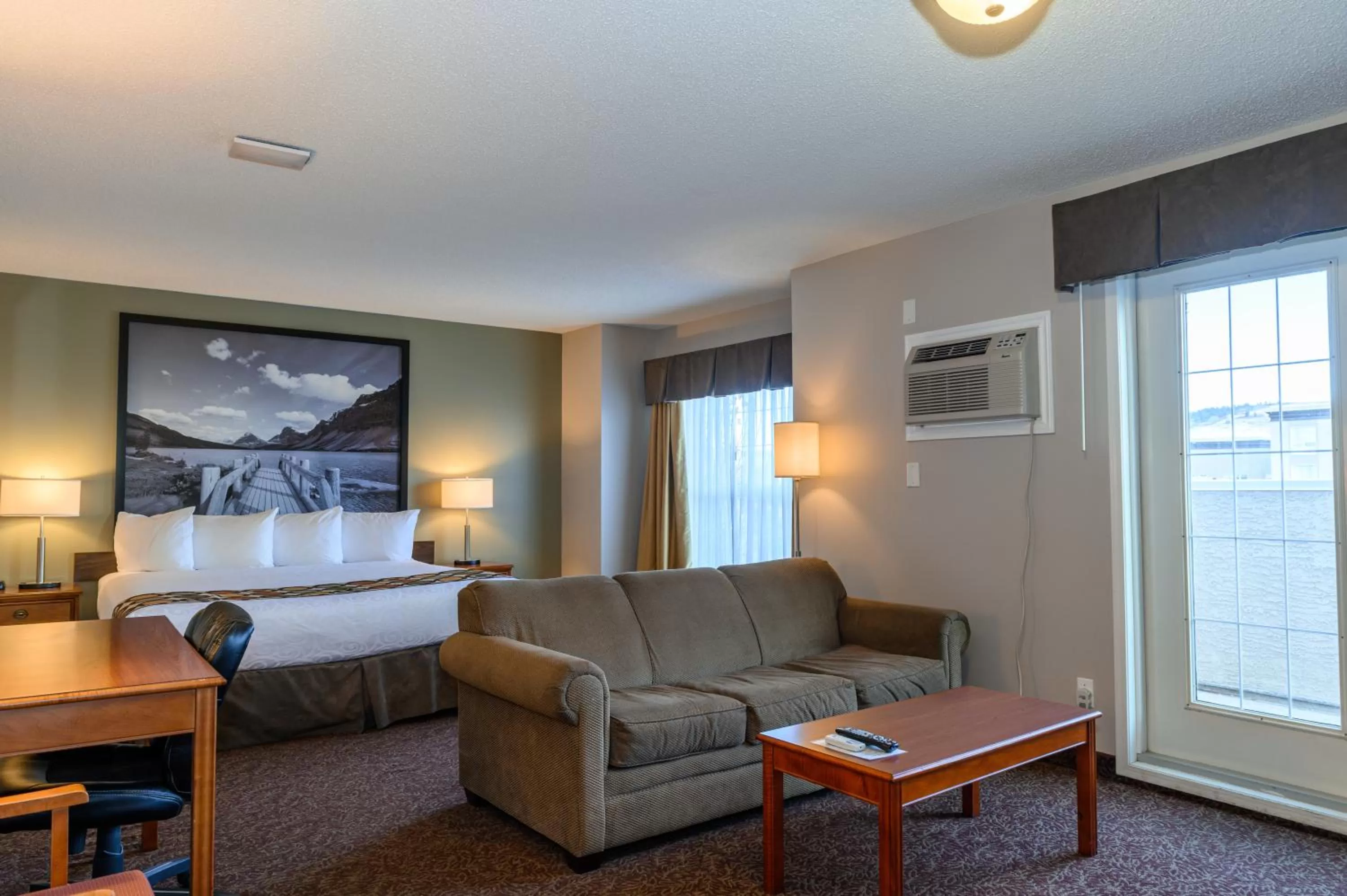 Bed in Super 8 by Wyndham Cochrane