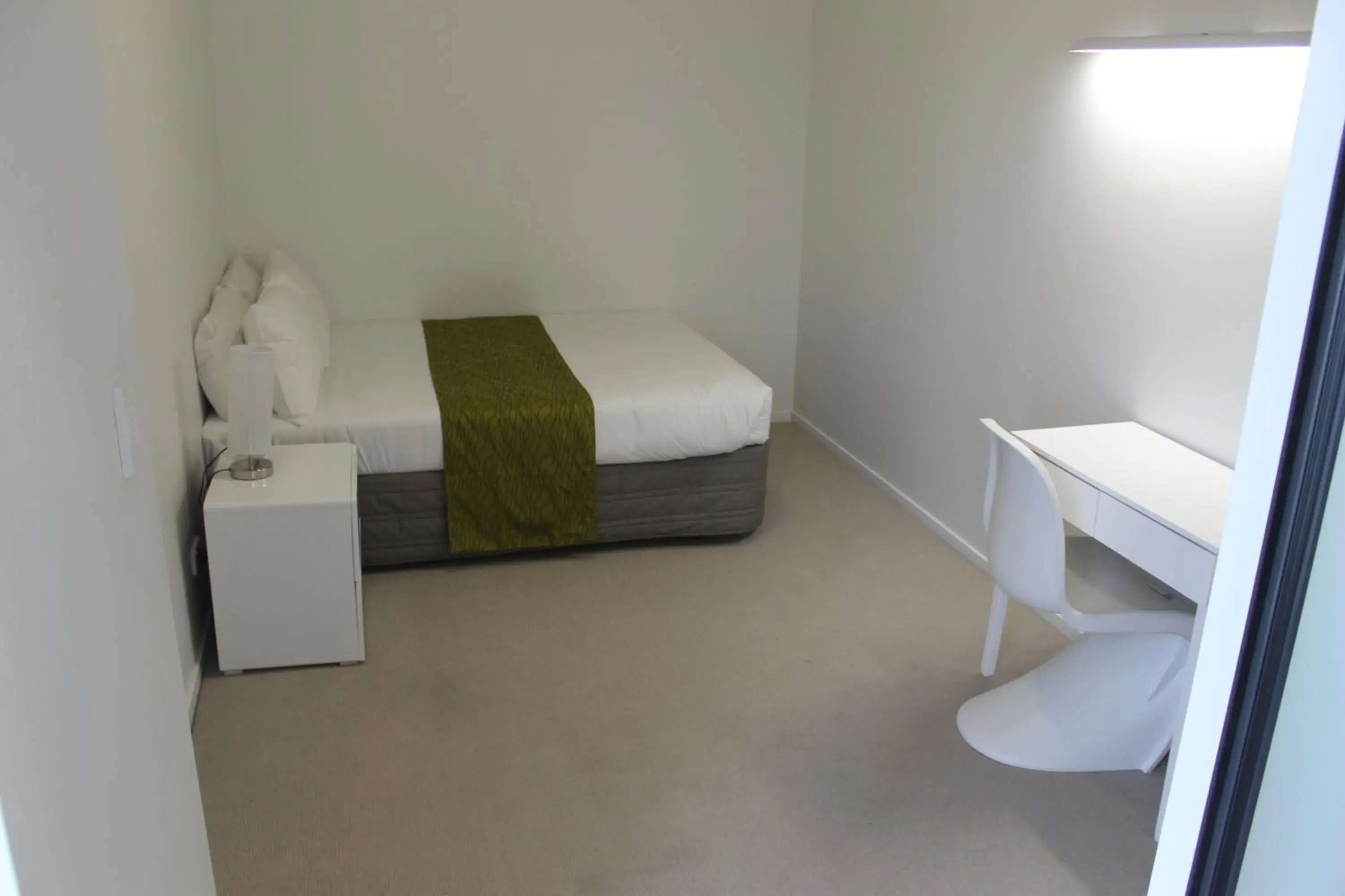 Photo of the whole room, Bed in MCentral Apartments Manukau