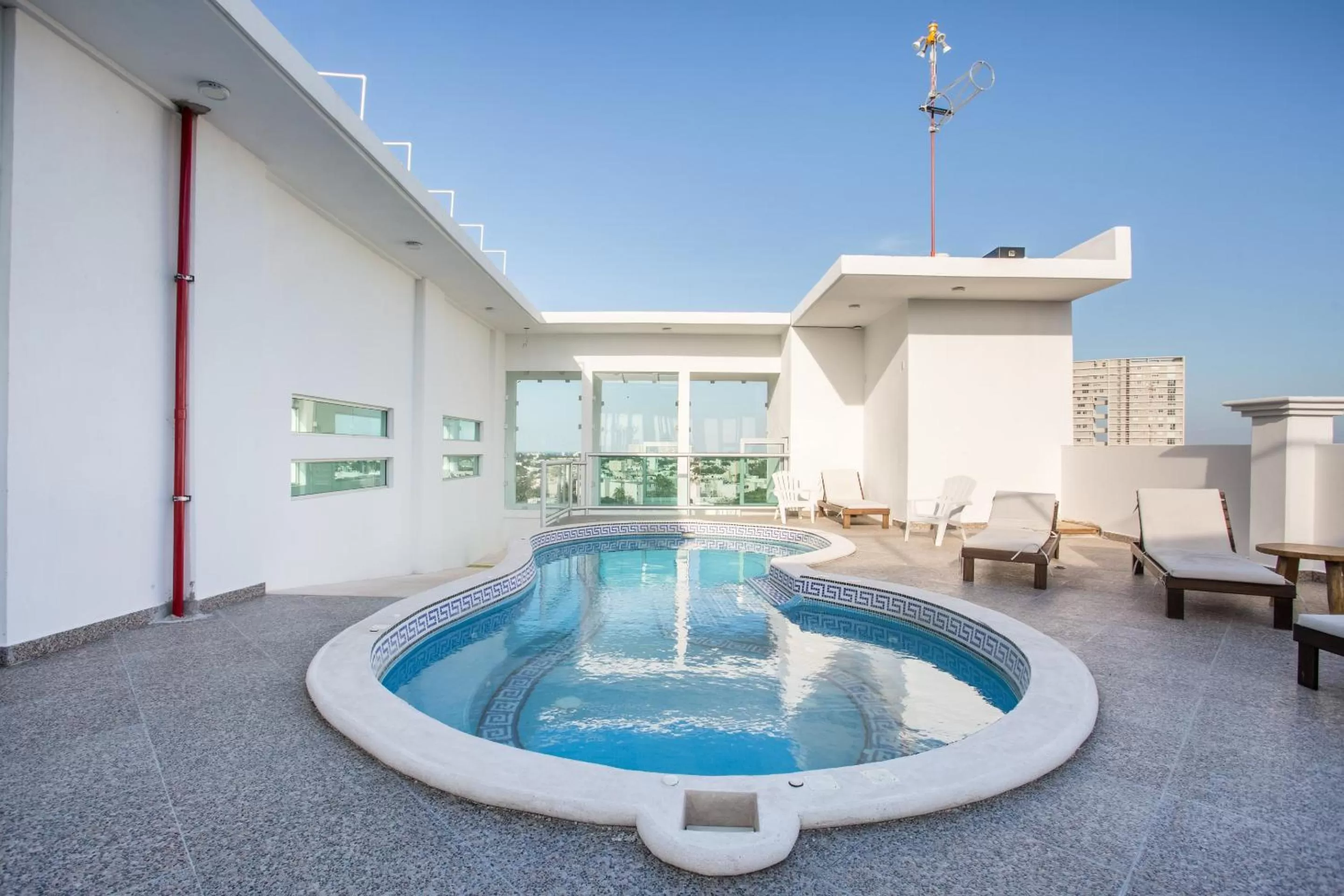 Swimming Pool in Capital O Cancun Ocean View, Cancún