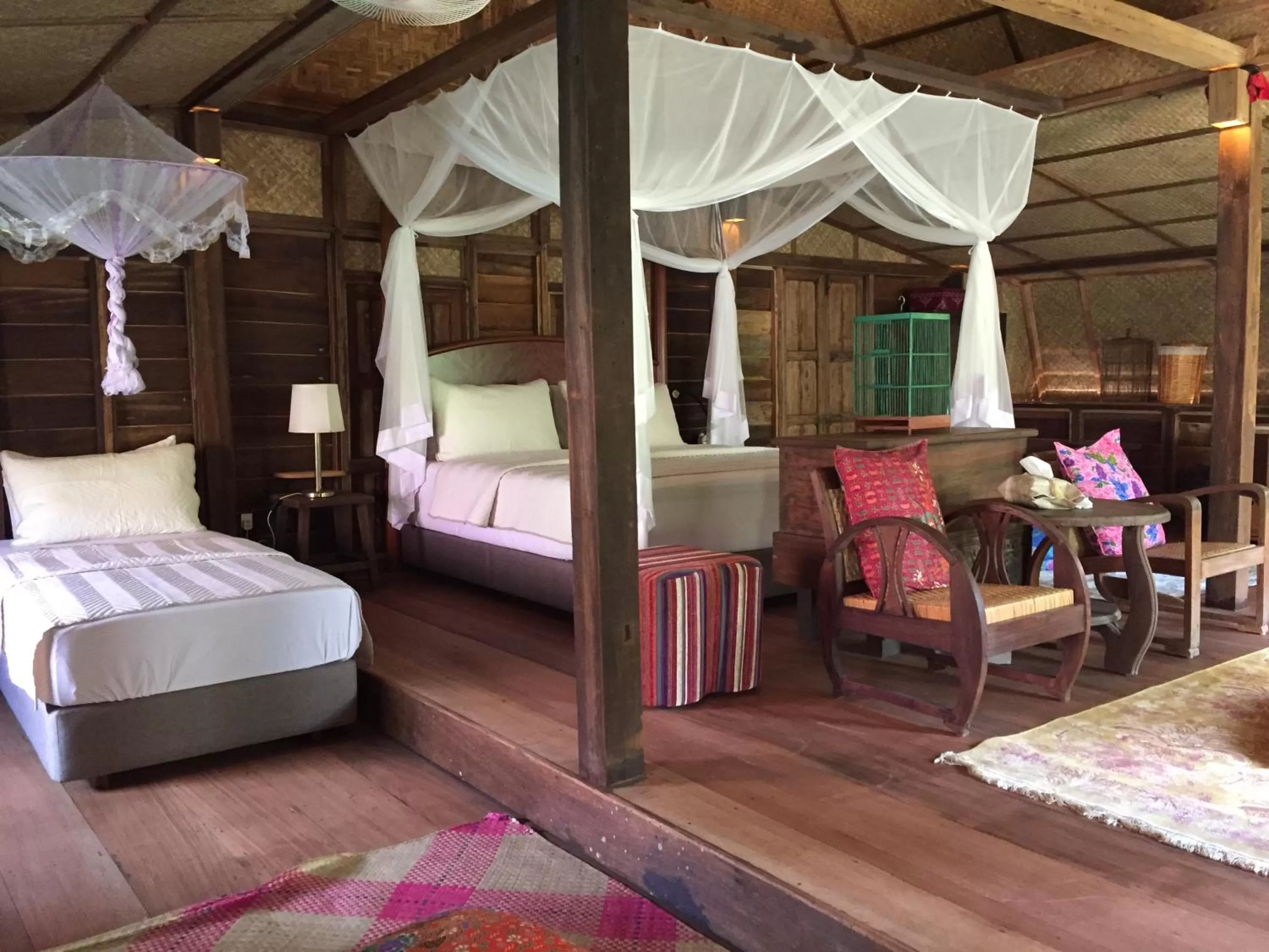 Bed in Kunang Kunang Heritage Villas