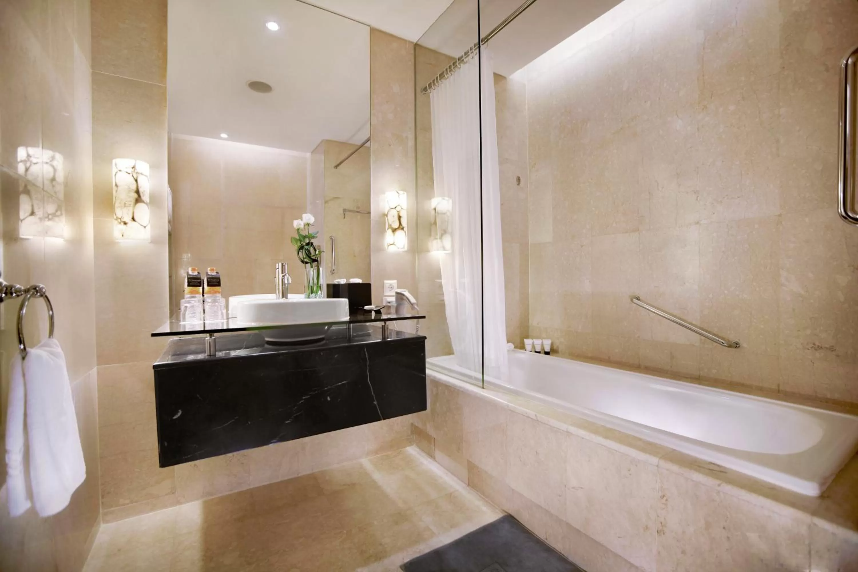 Bathroom in The Grove Suites by Grand Aston