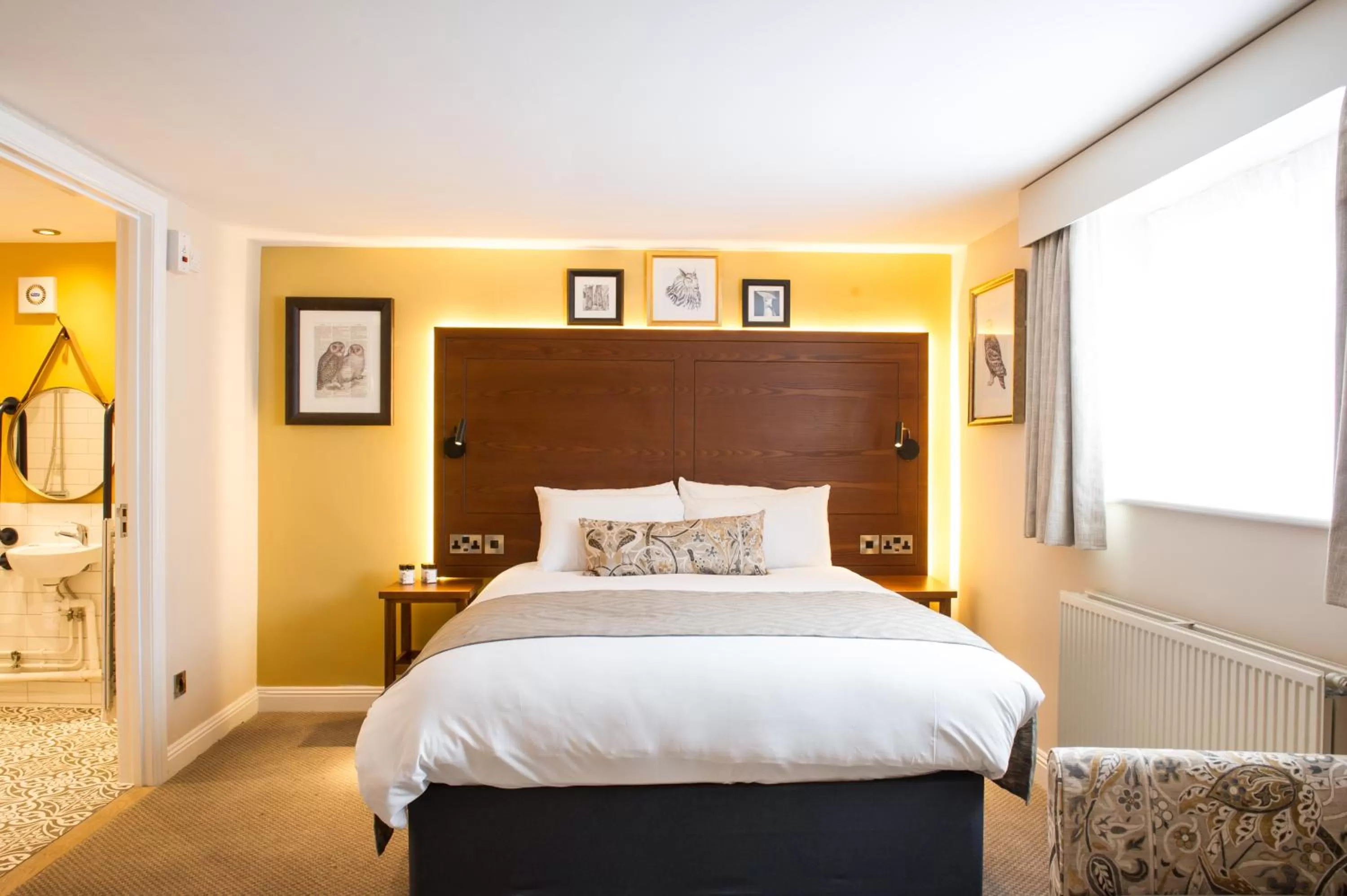 Bed in The Snowy Owl by Innkeeper's Collection