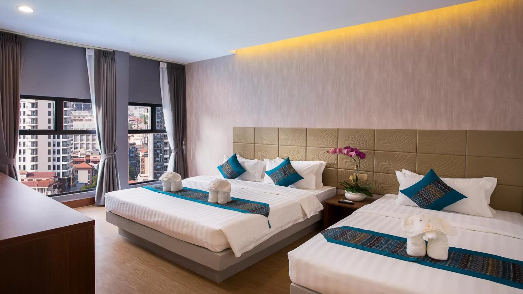 Photo of the whole room, Bed in Orussey One Boutique