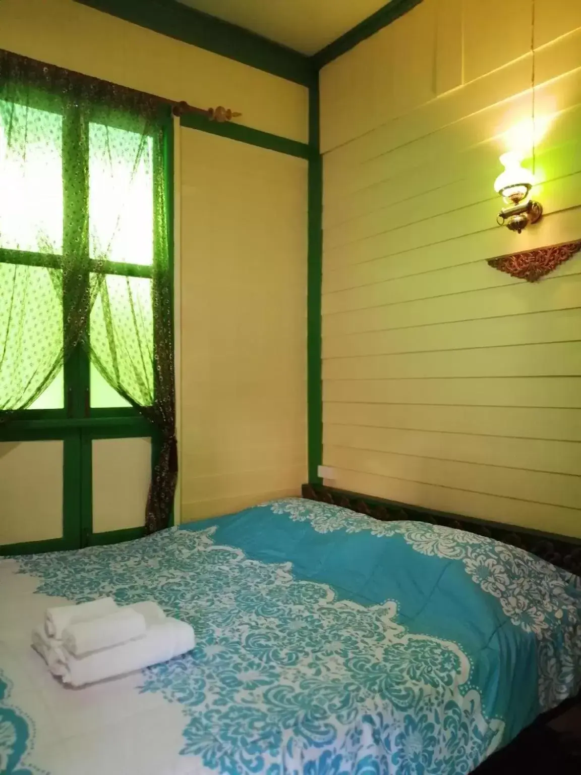 Bed in Baan Tepa Boutique House
