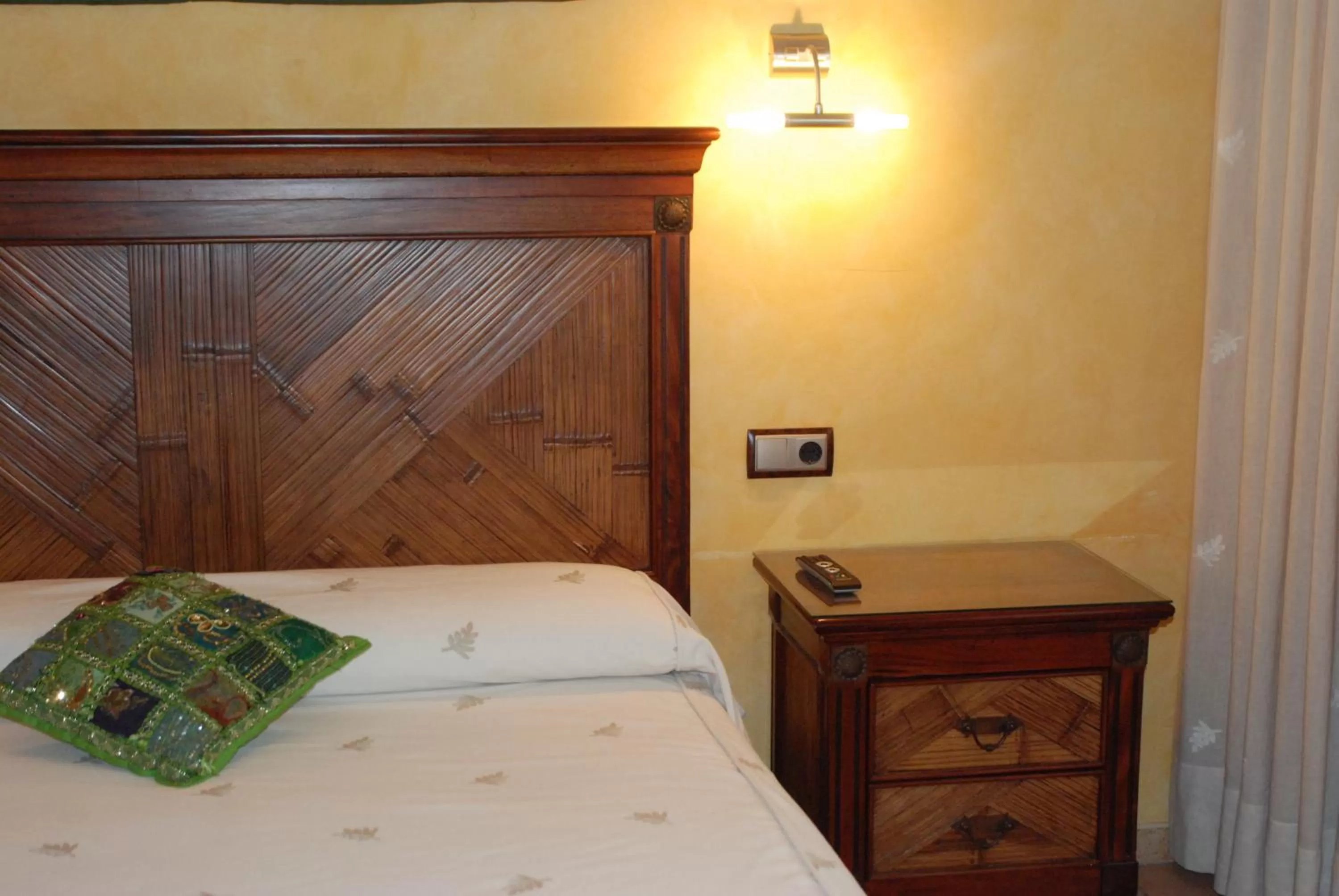 Bed in L'Agora Hotel