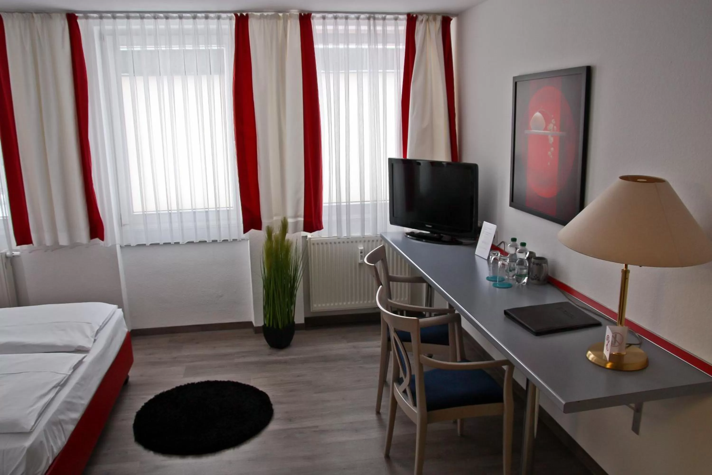 TV/Entertainment Center in Hotel Postbauer-Heng