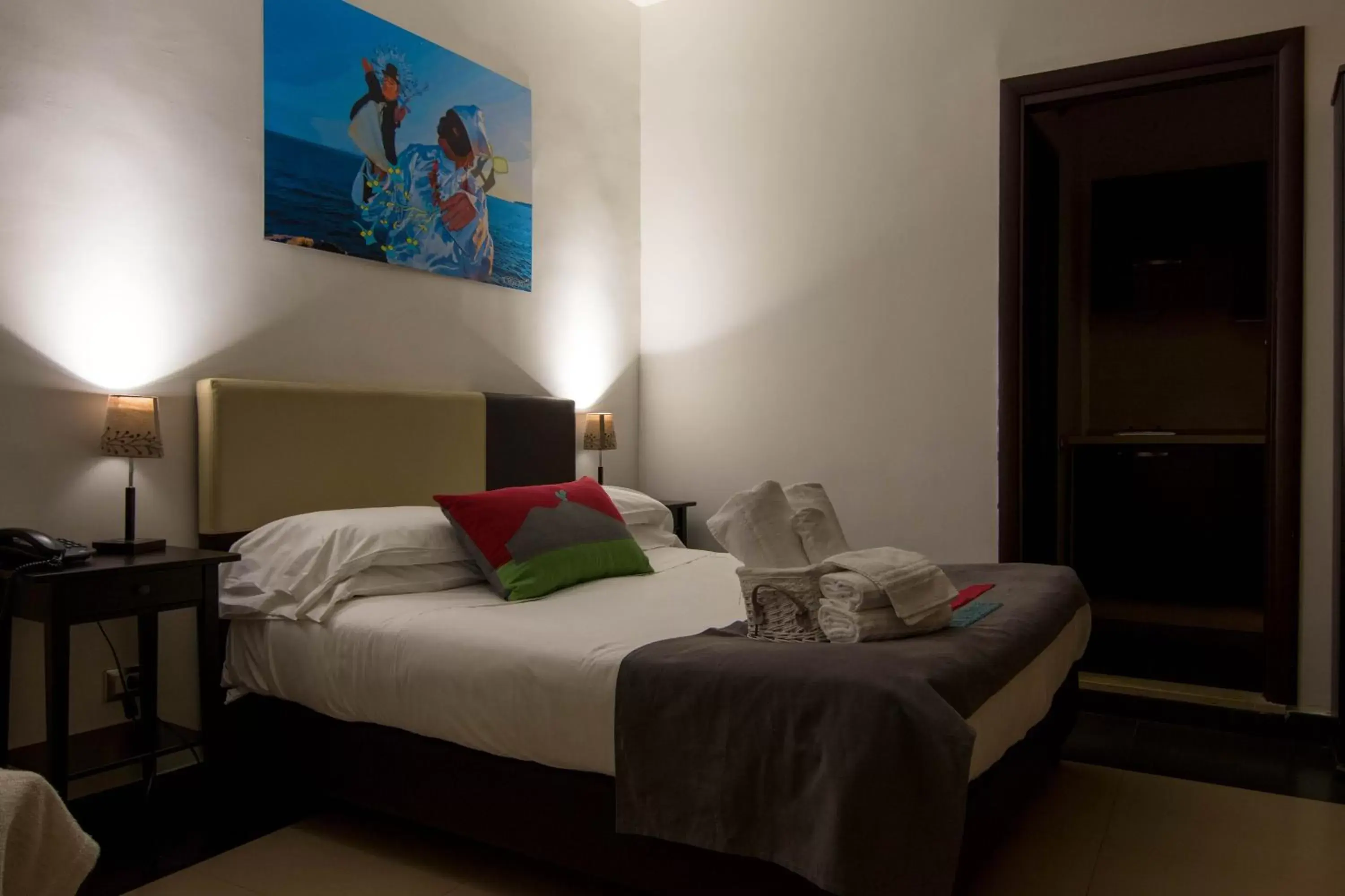 Bedroom in Hotel Plebiscito Aparthotel