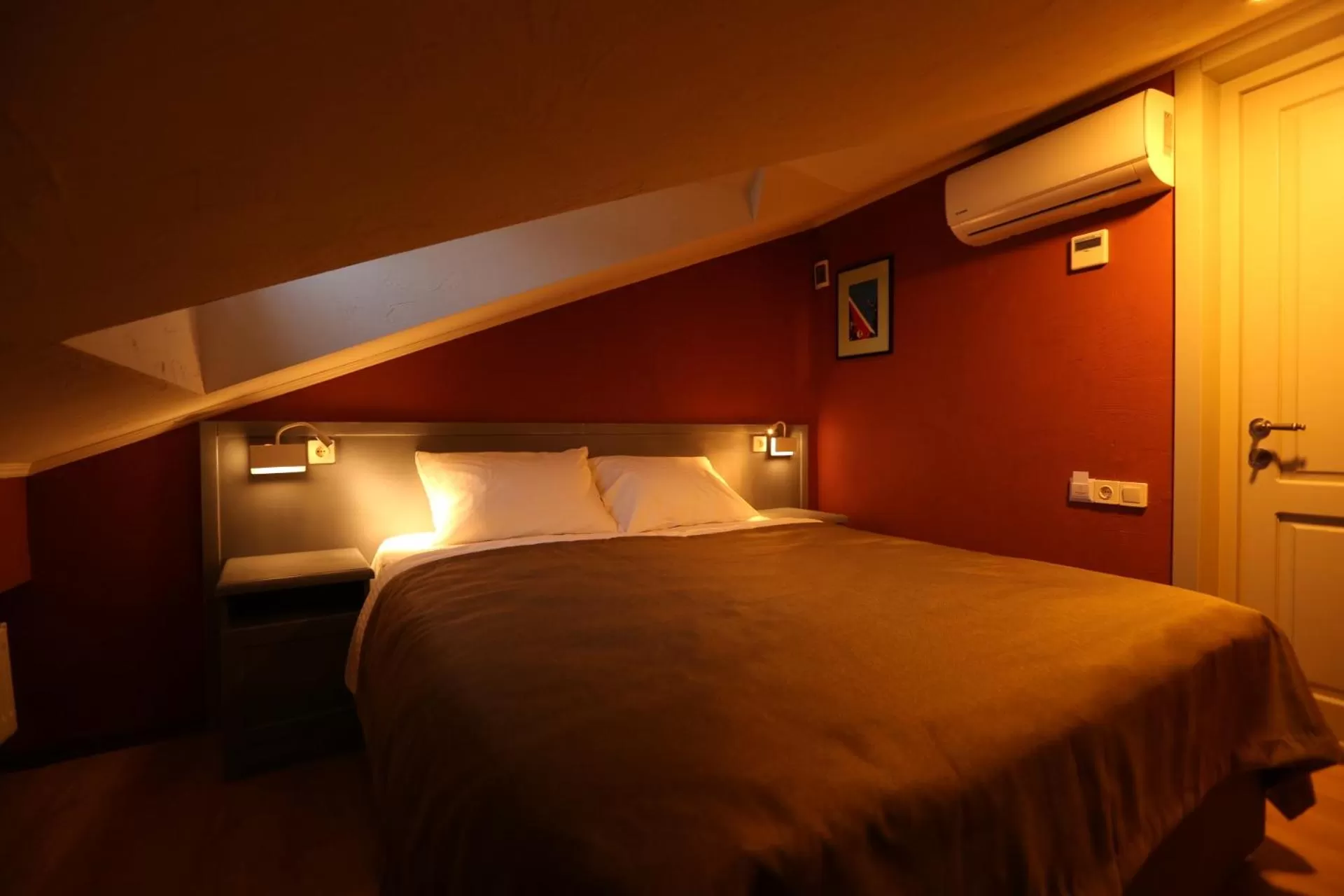 Bed in Kindli Boutique Hotel