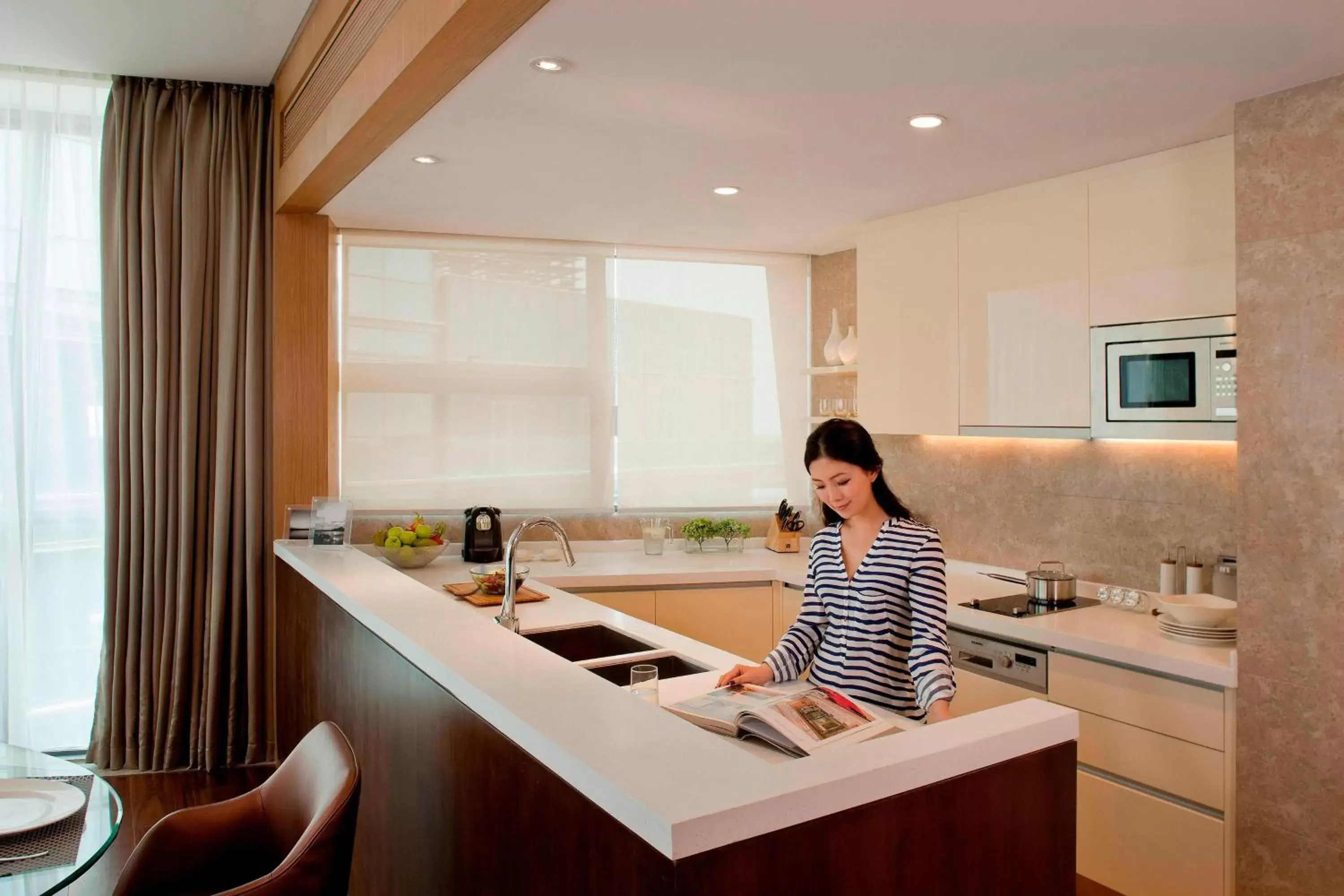 Bedroom, Kitchen/Kitchenette in The OCT Harbour, Shenzhen - Marriott Executive Apartments