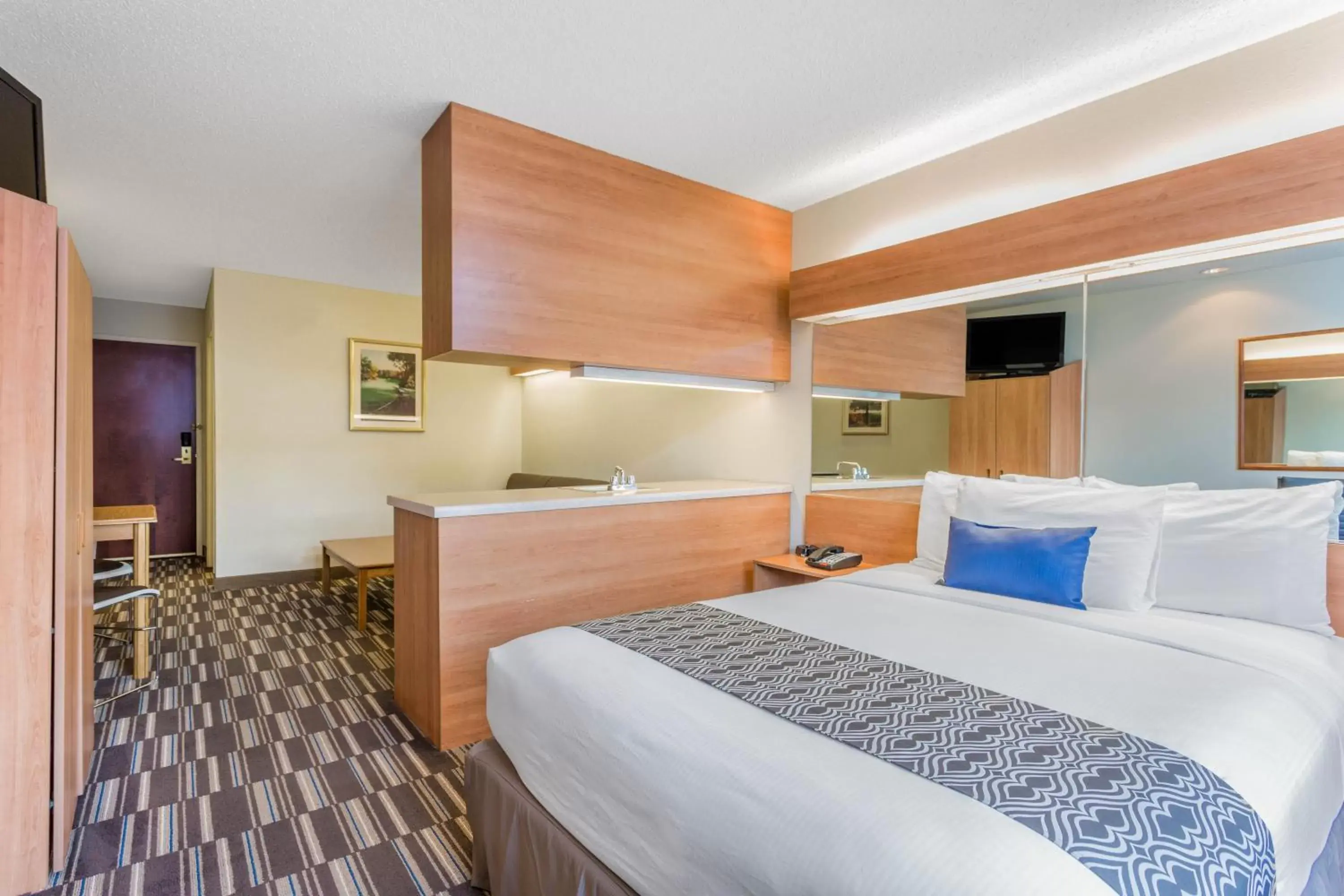 Bed in Microtel Inn & Suites by Wyndham Lillington/Campbell University Bed in Microtel Inn & Suites by Wyndham Lillington/Campbell University
