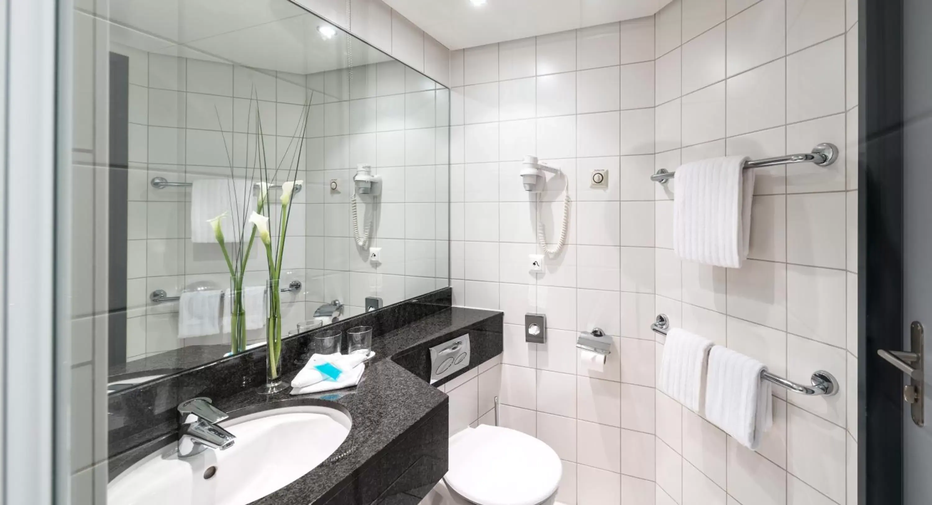 Bathroom in Essential by Dorint Basel City