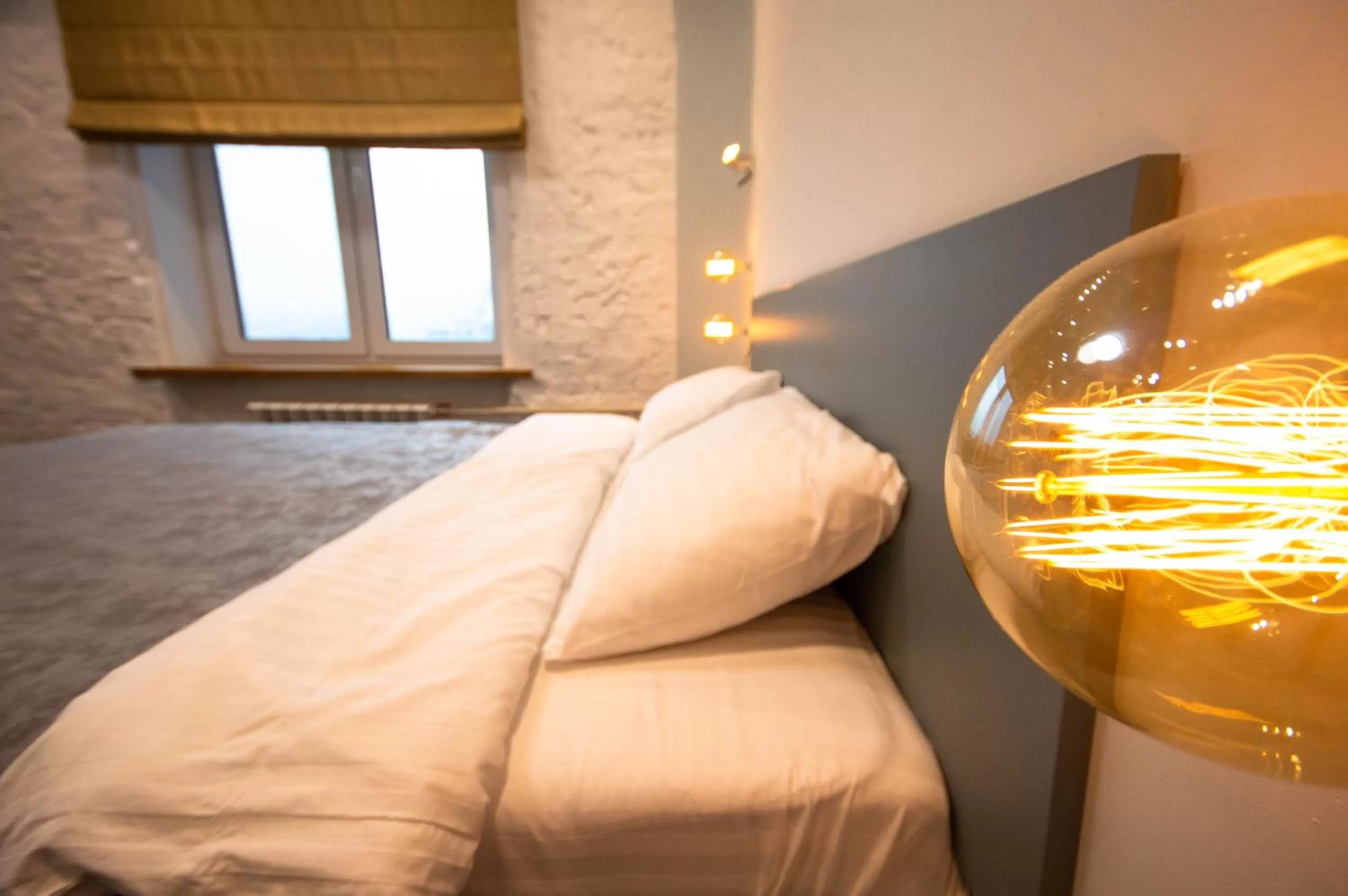 Bed in Kyiv Panorama Apartments near Gulliver