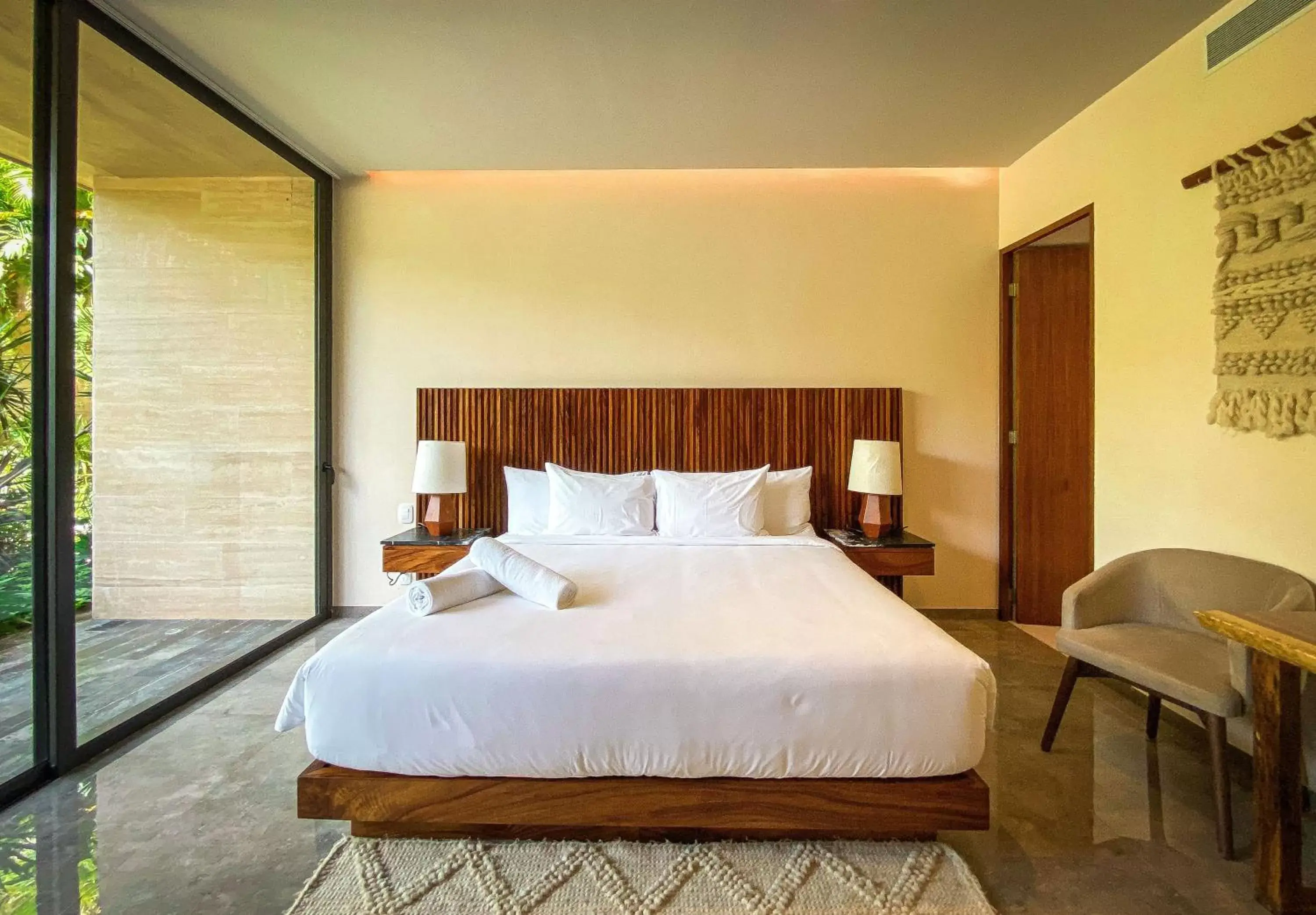 Bed in MISTIQ Tulum Luxury Apartments