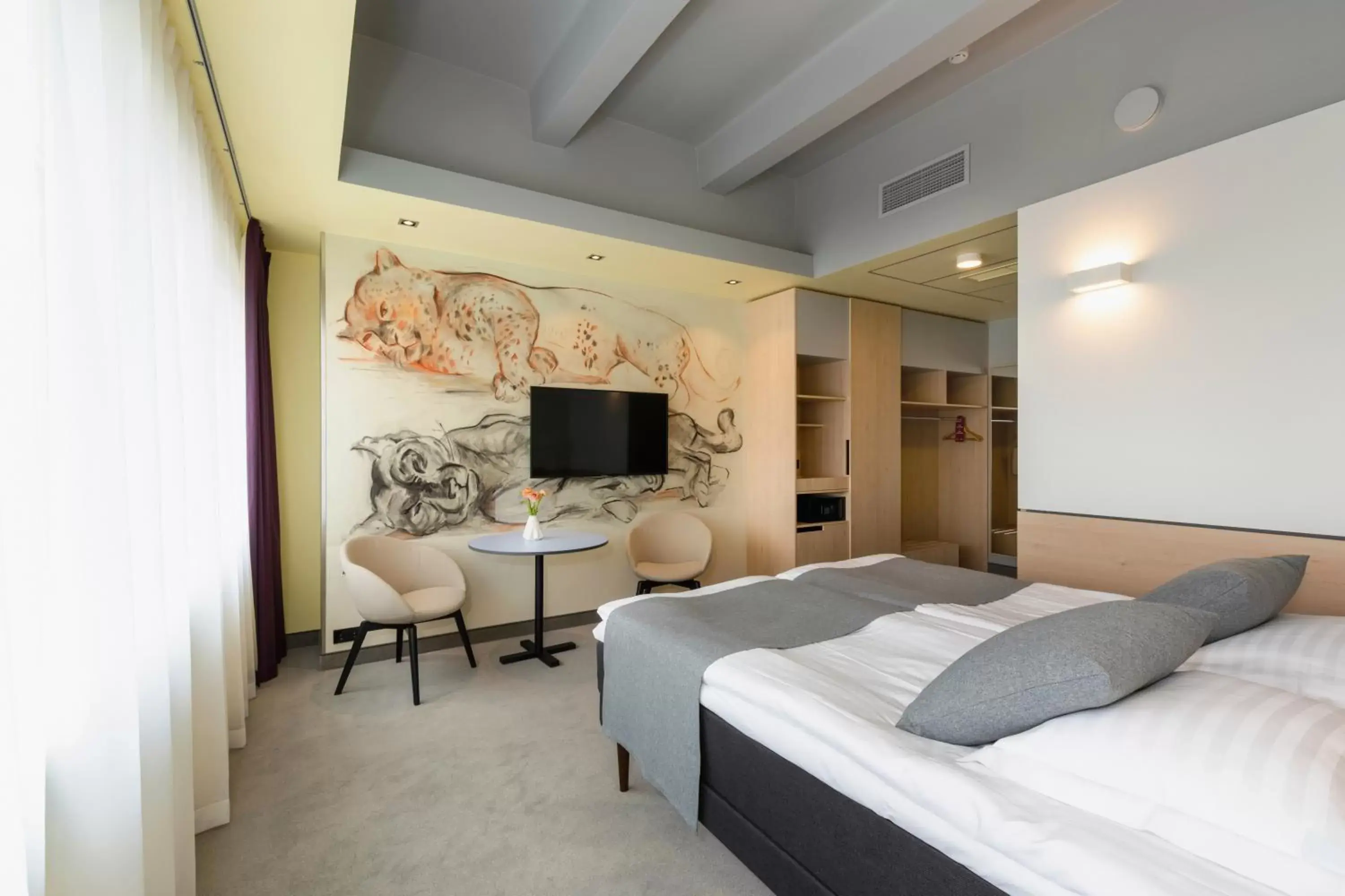 Bed in Art Hotel Pallas by Tartuhotels