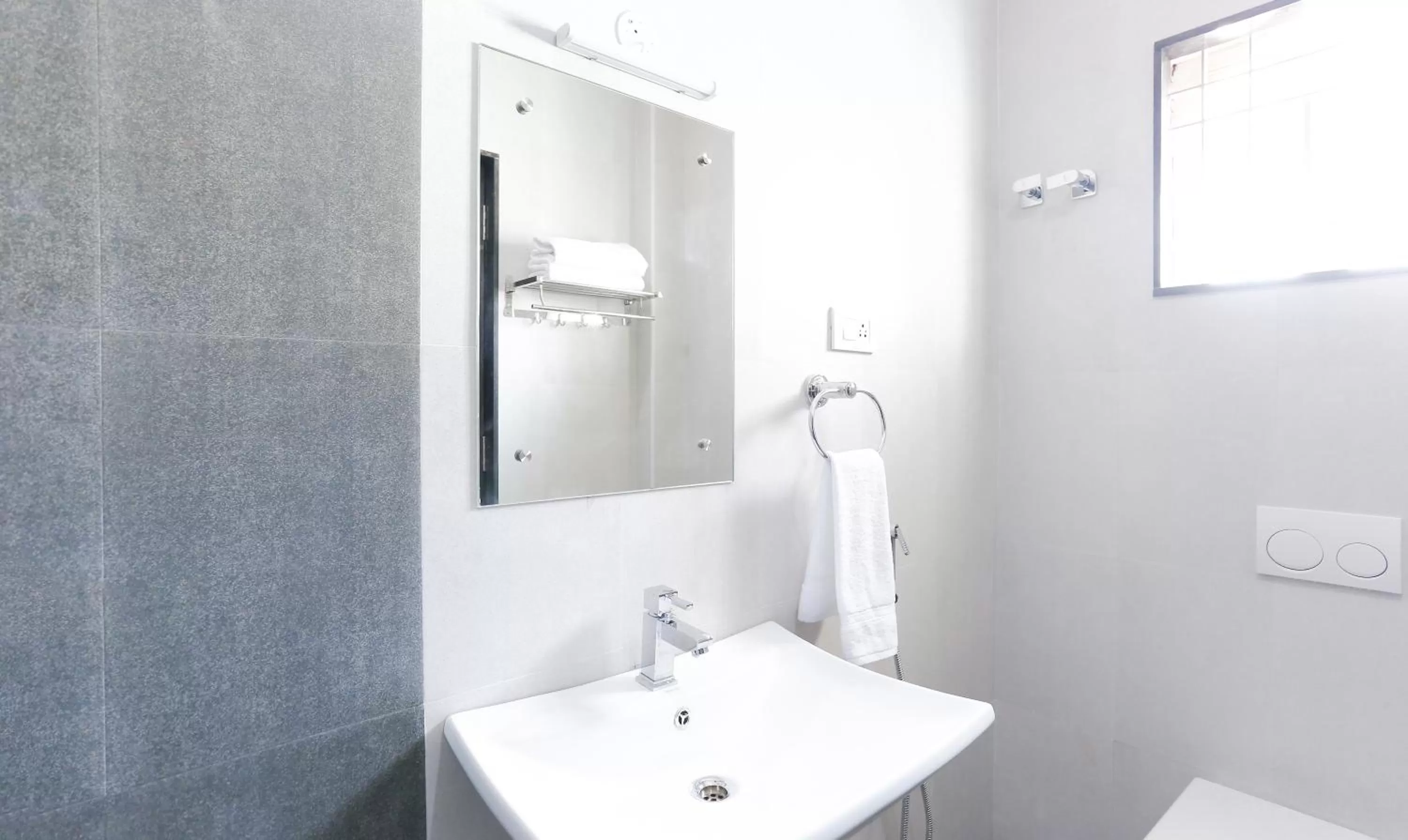 Bathroom in Treebo Hi Line Apartments Kalapatti