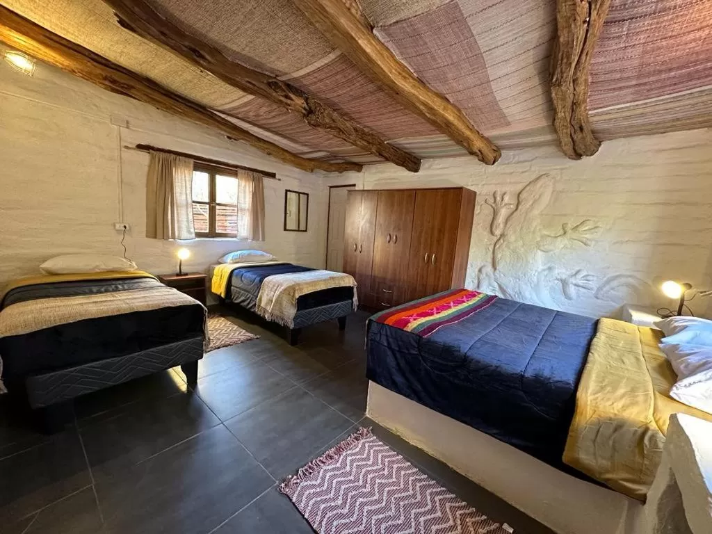 Bed in CaminAndes Hostal