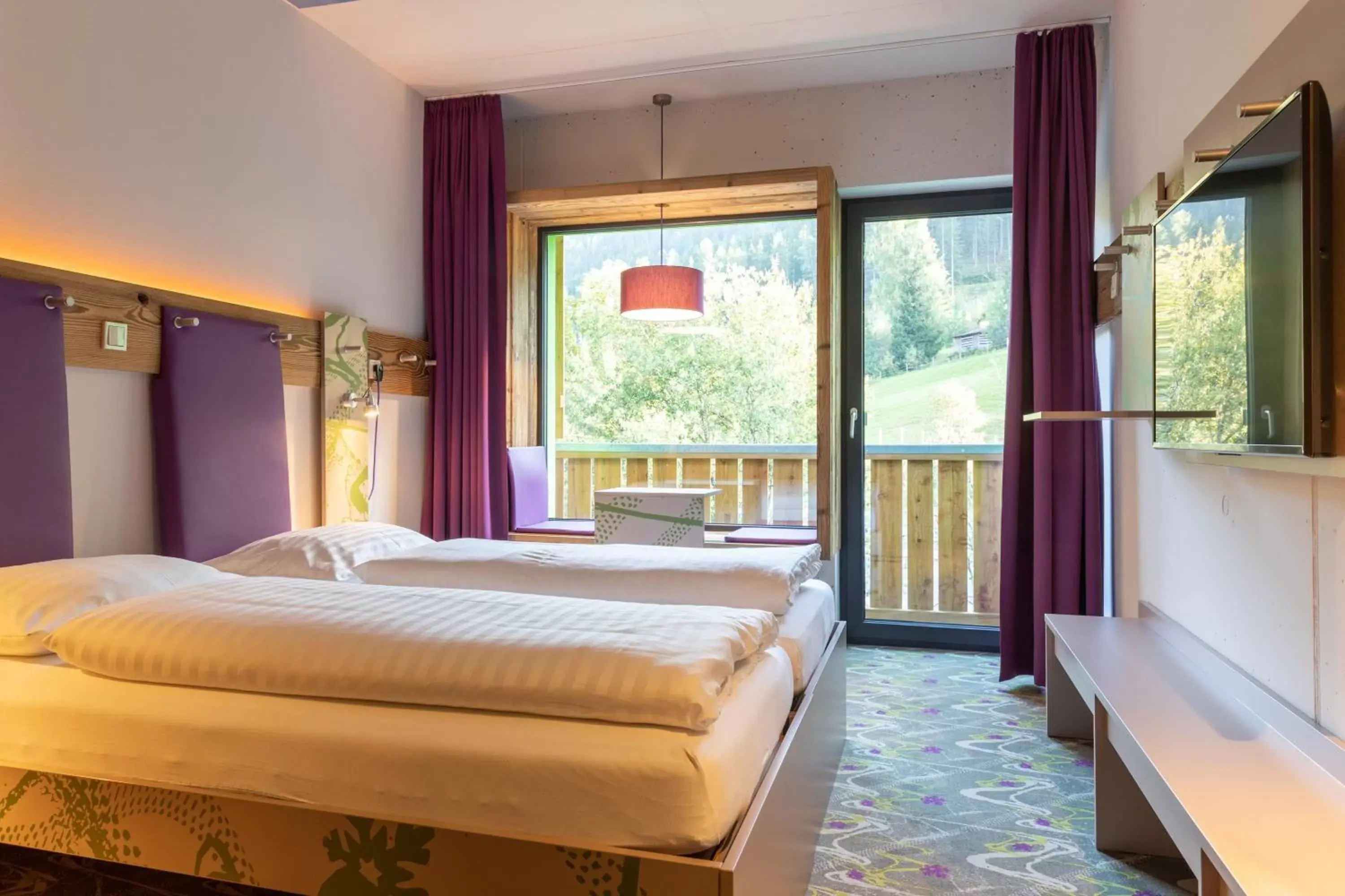 Bedroom, Bed in Explorer Hotel Neuschwanstein