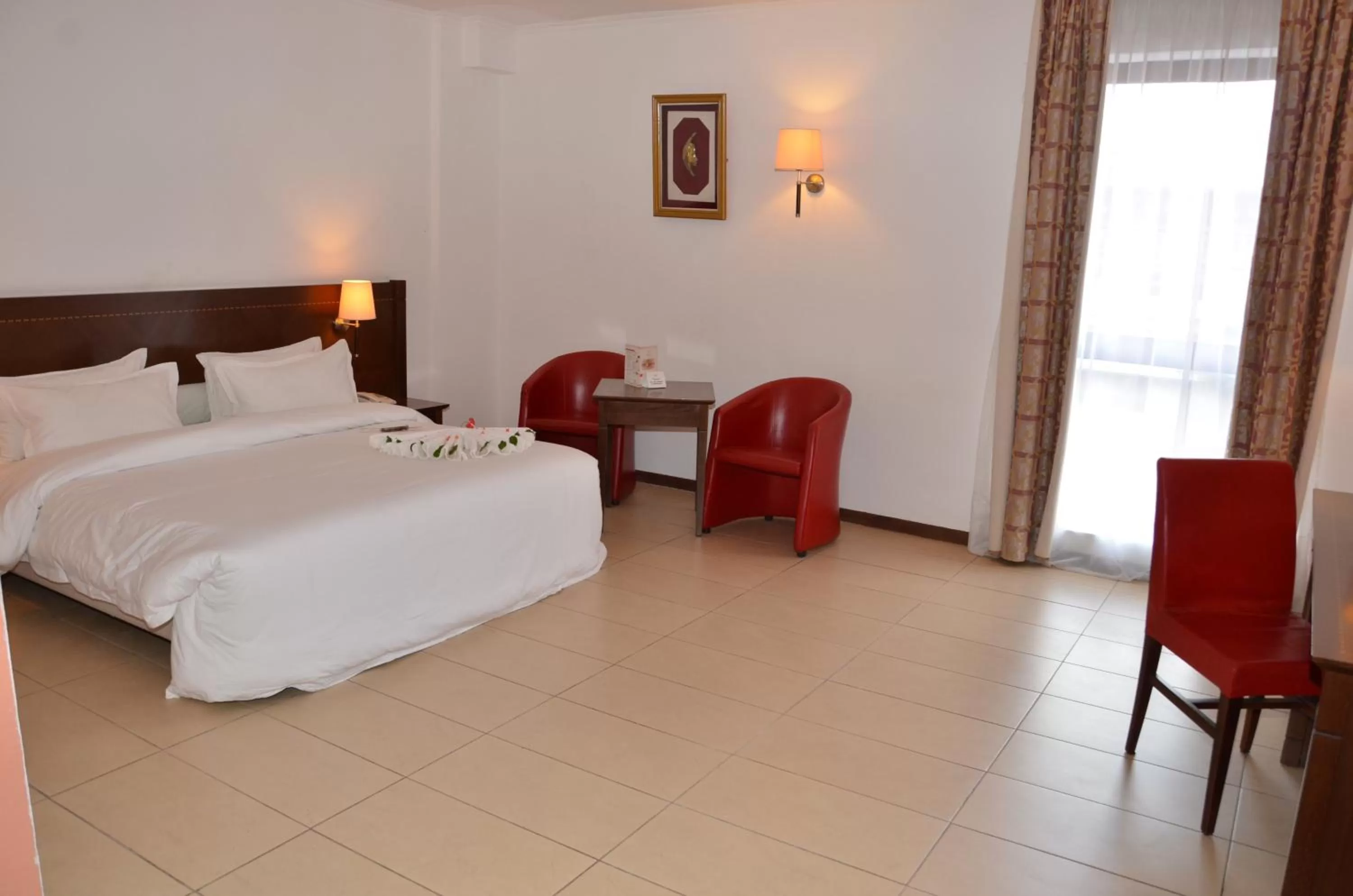 Bed in Djeuga Palace Hotel