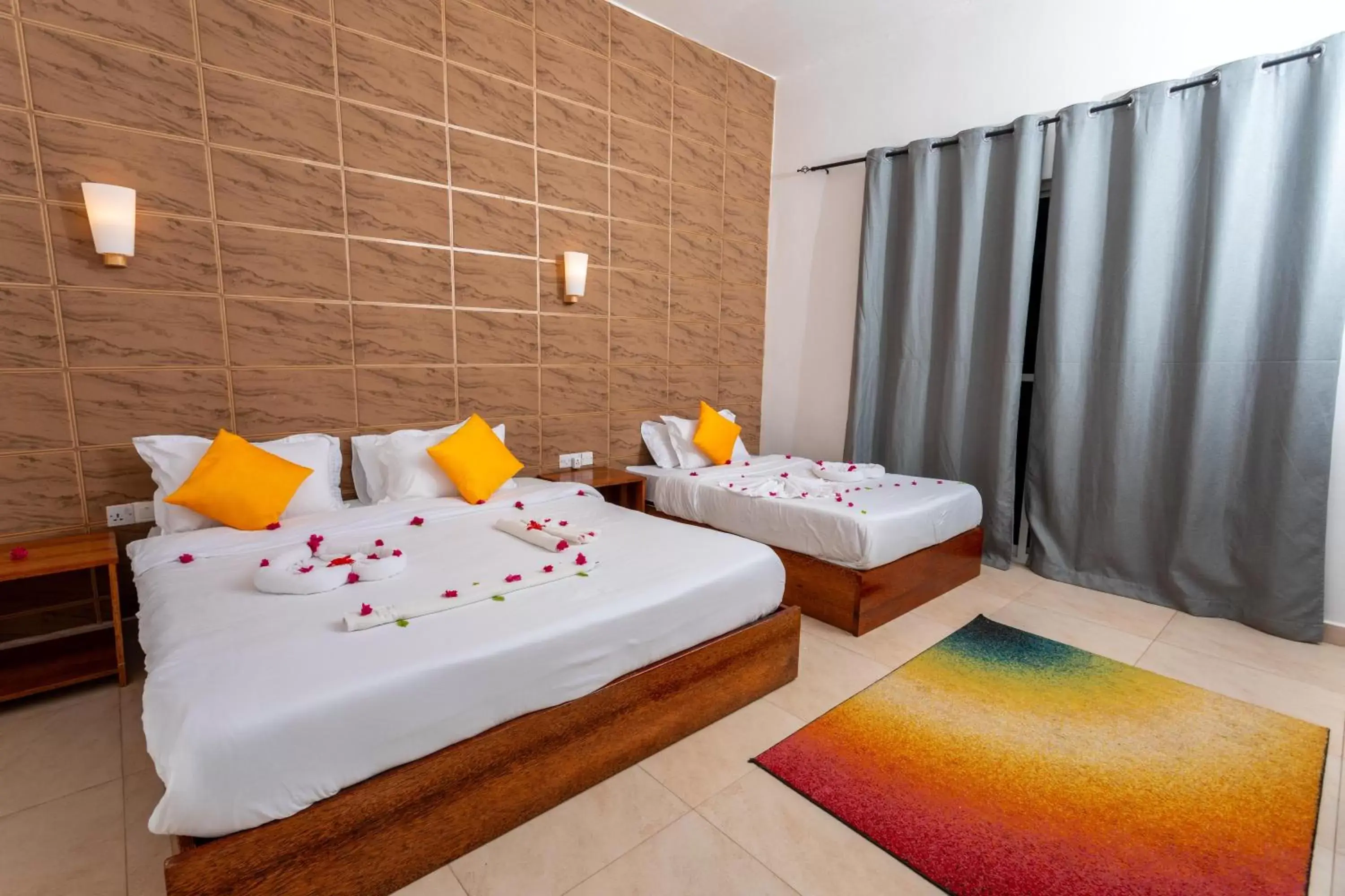 Bed in Canary Nungwi Hotel & Free SPA