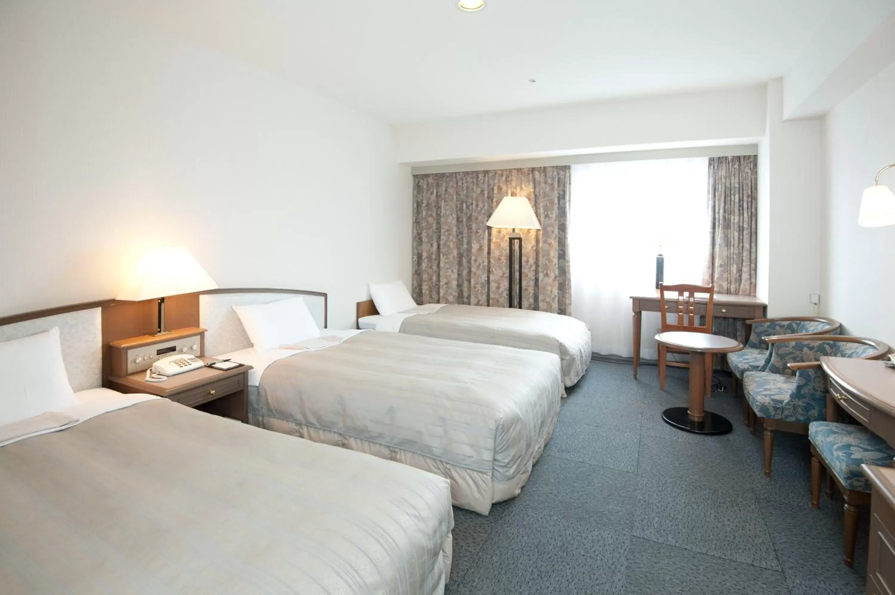 Photo of the whole room, Bed in Hotel Sunroute Niigata