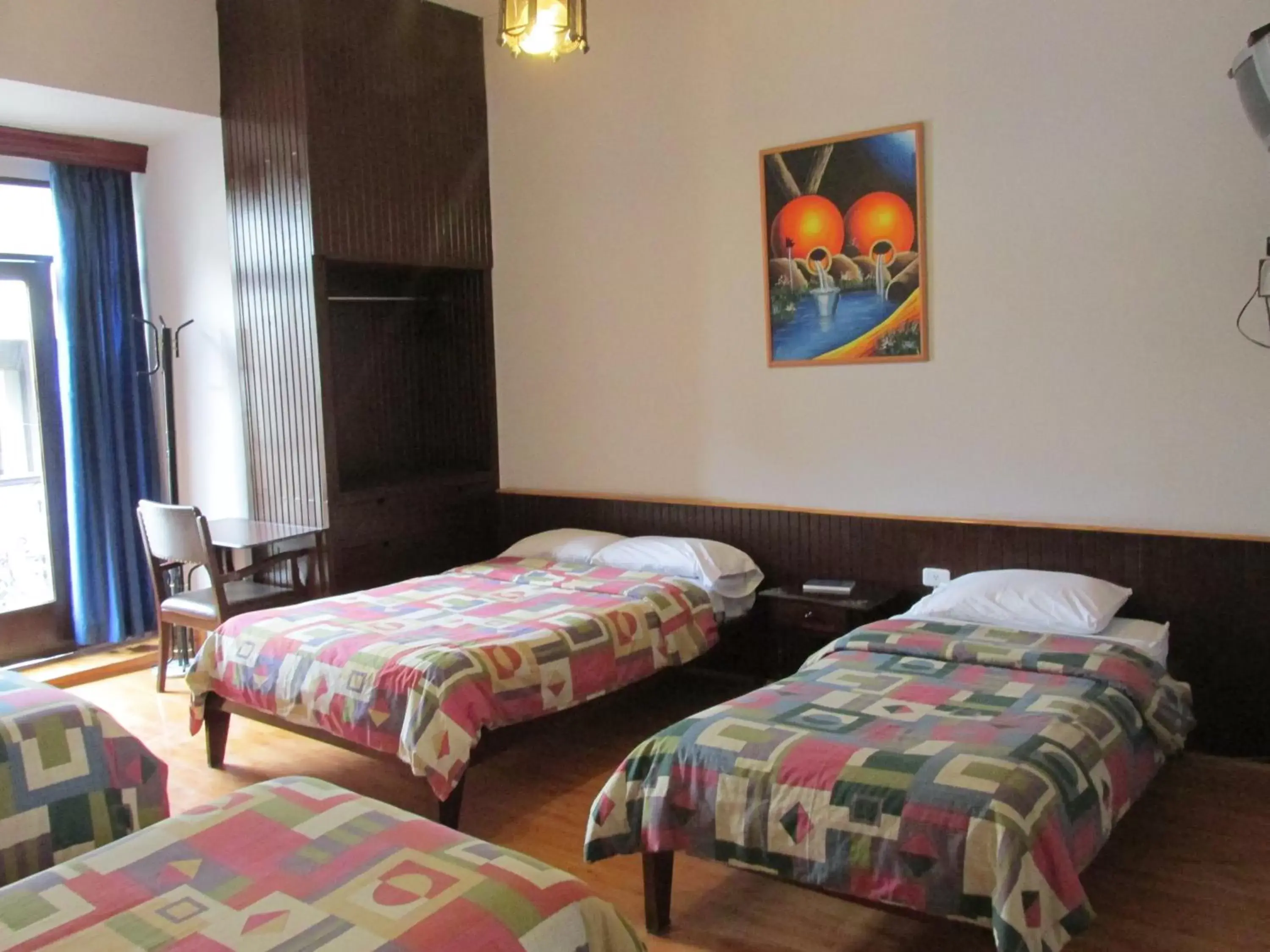 Quadruple Room in Hotel Montecarlo Quadruple Room in Hotel Montecarlo