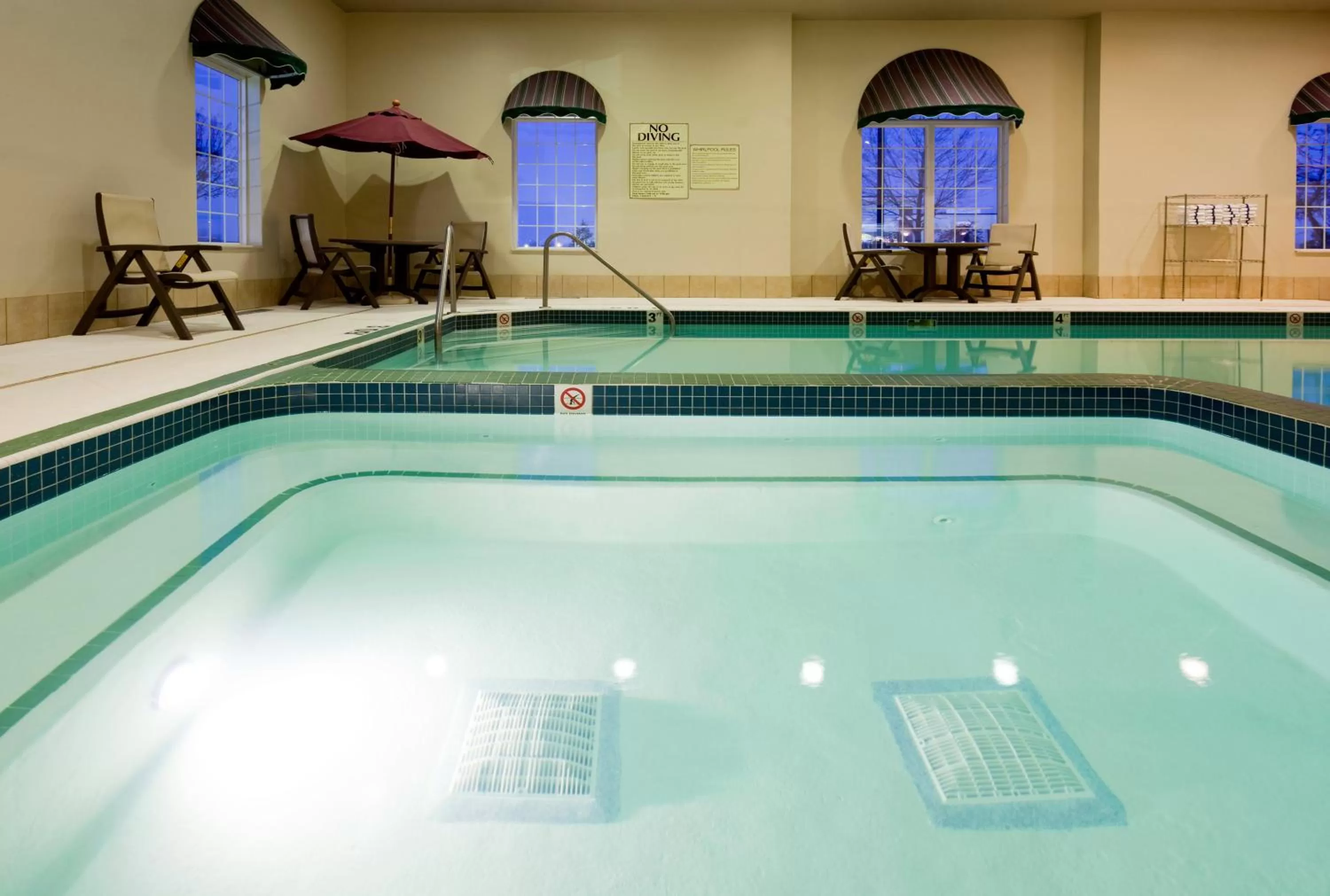 Swimming pool in Holiday Inn Express Hotel & Suites Oshkosh - State Route 41 by IHG