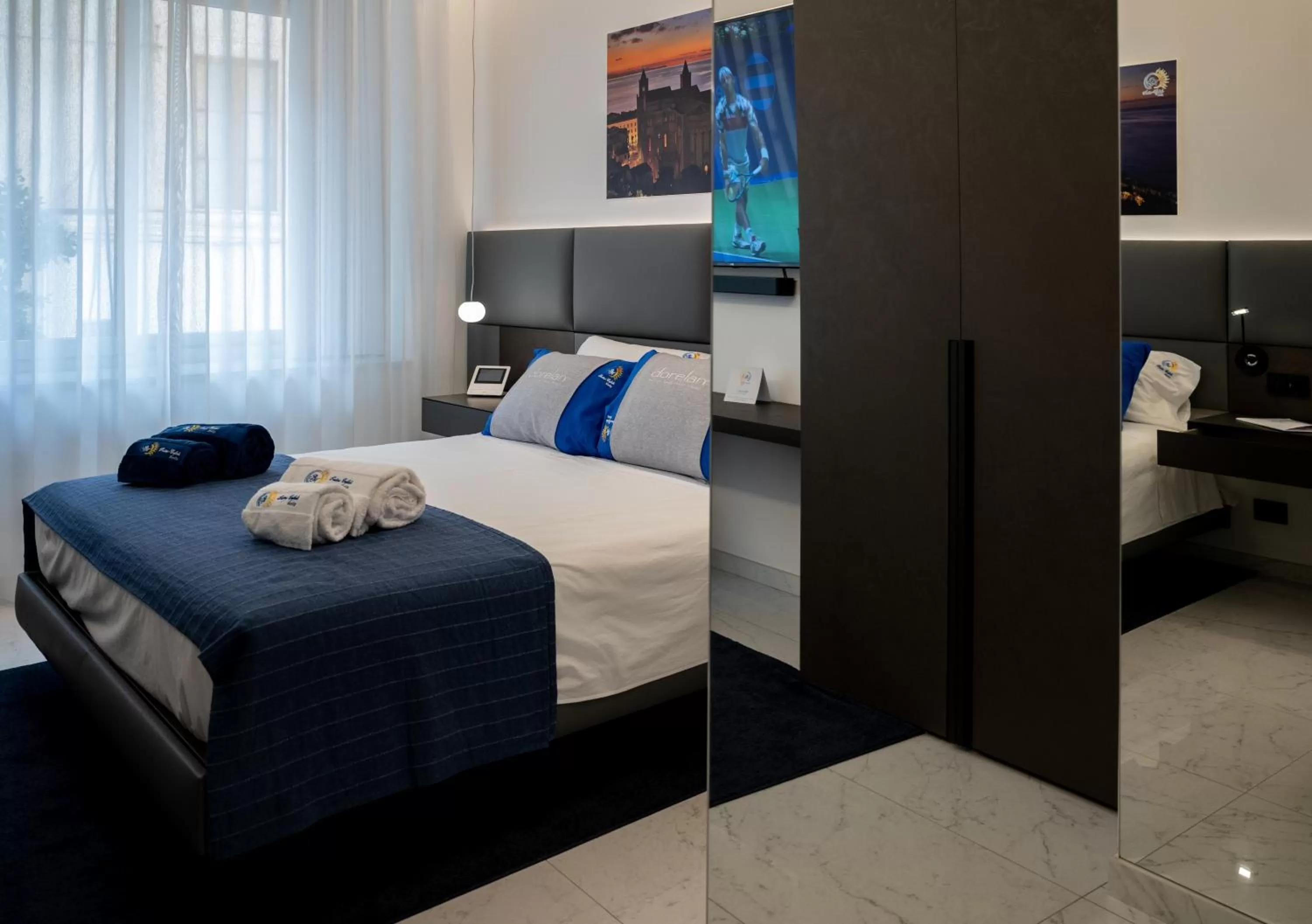 Photo of the whole room, Bed in BM SUITES CEFALU