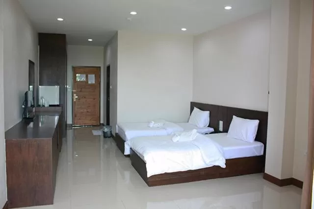 Bed in Amatara Hotel