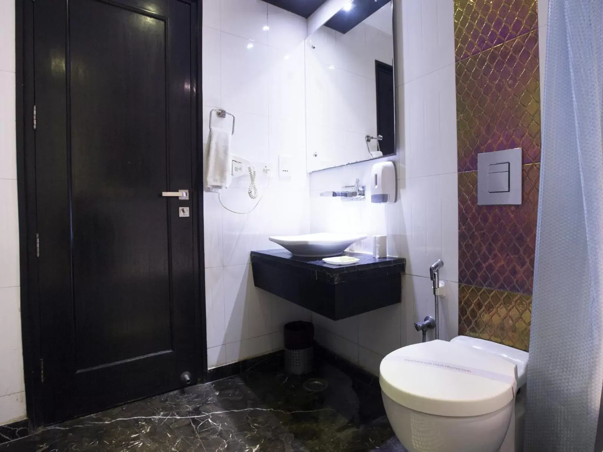 Bathroom in Hotel Krishna - By RCG Hotels