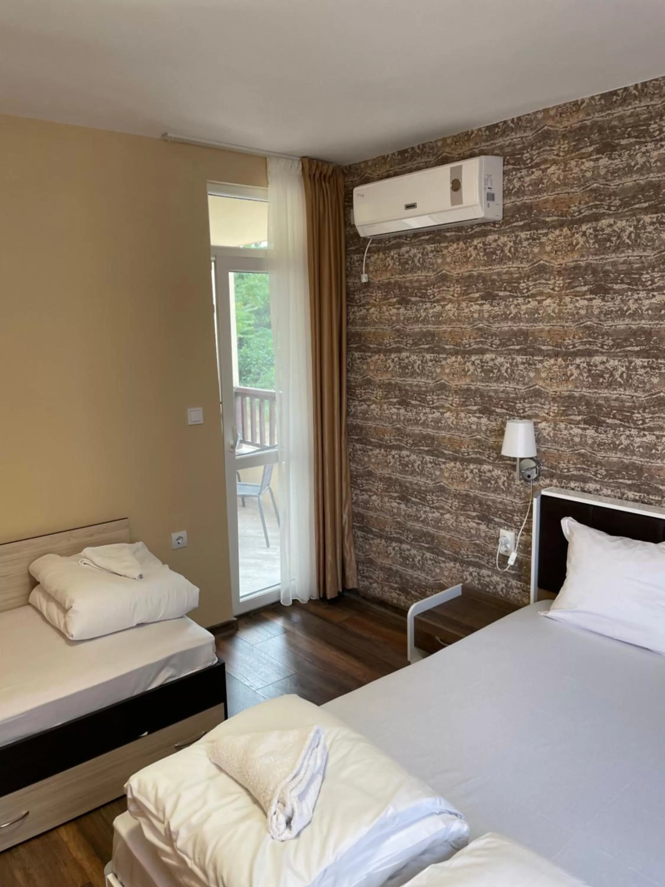 Bed in Family Hotel Malibu